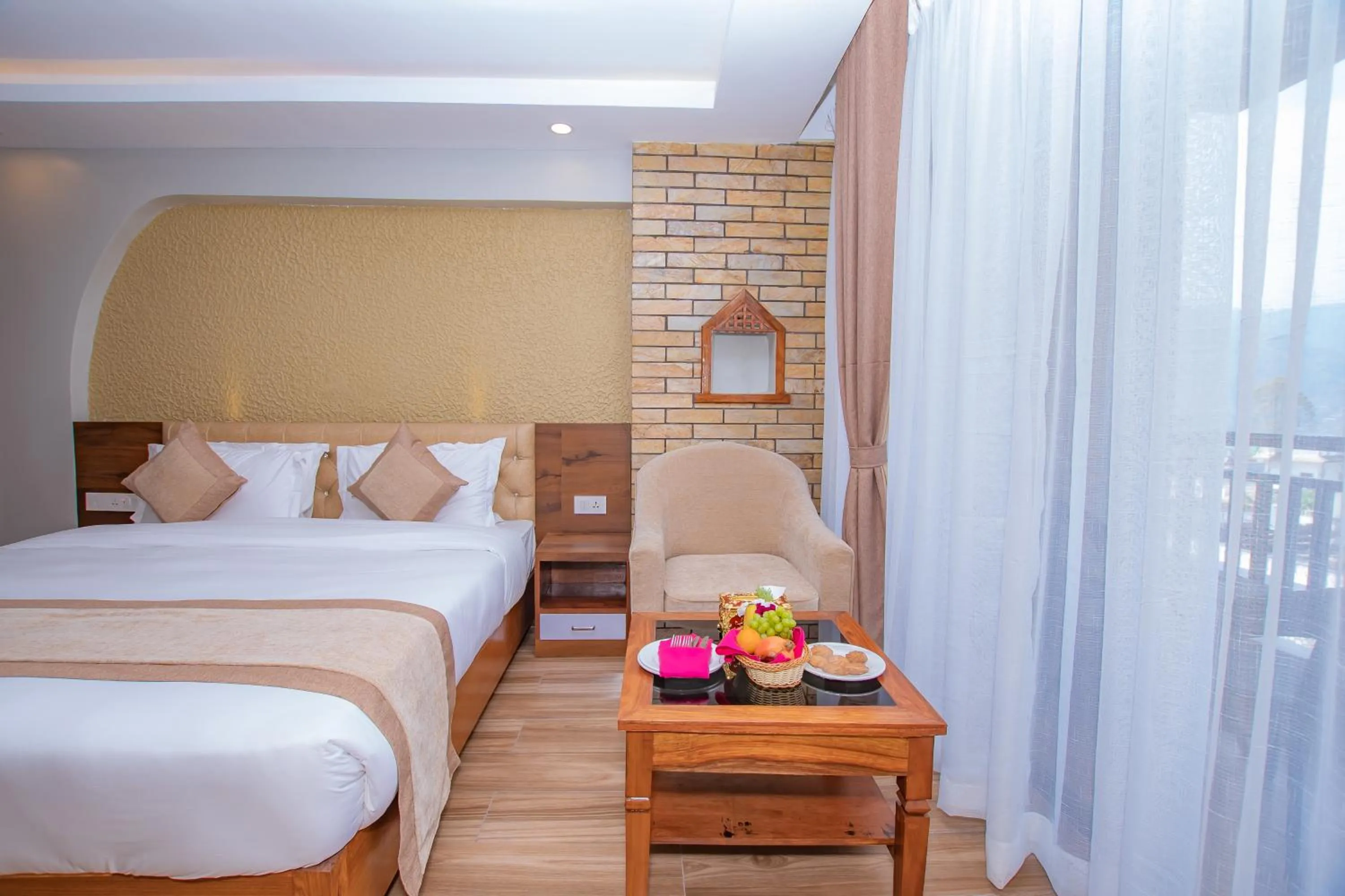 Bed in Hotel Pokhara Village & SPA