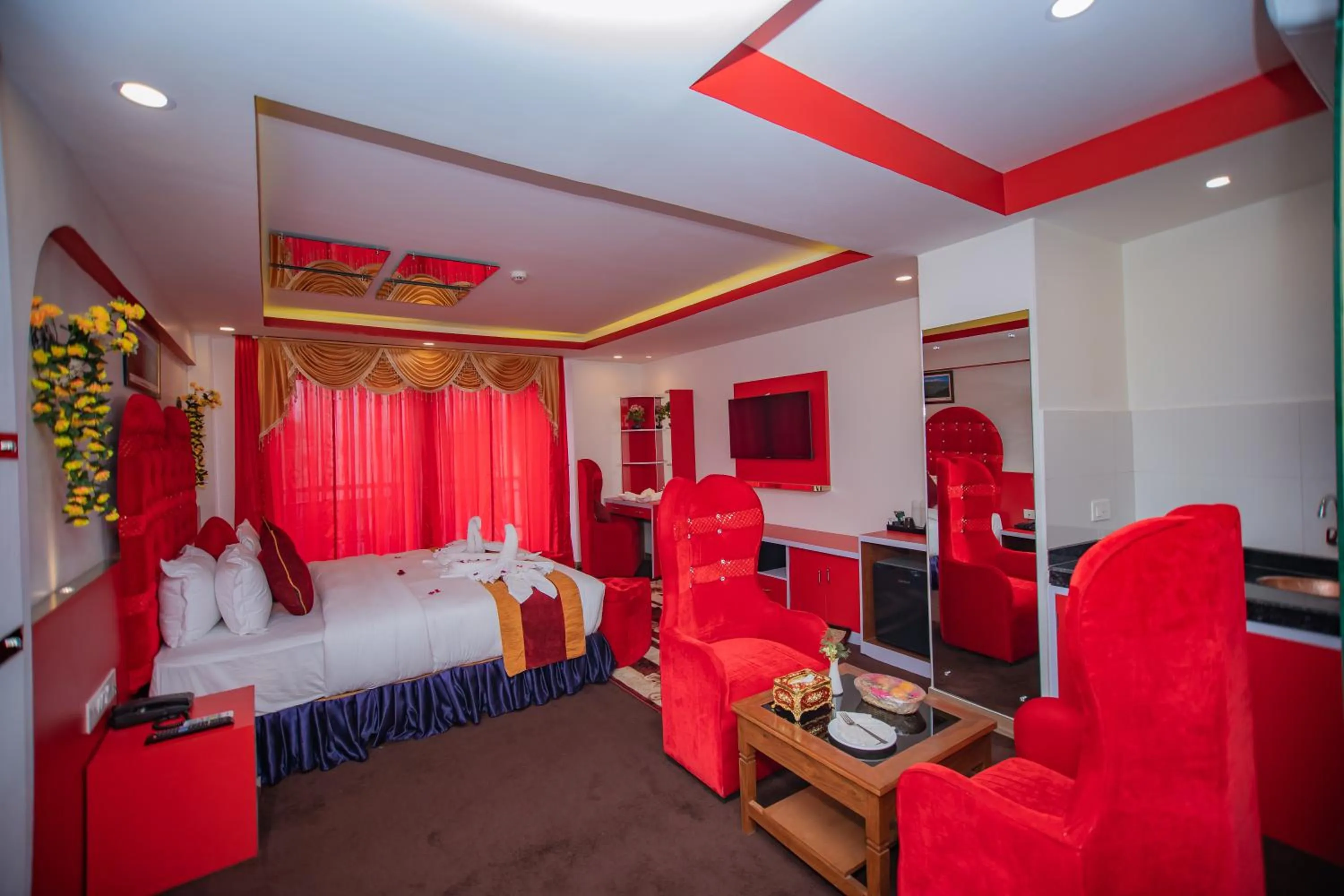 Bedroom, Bed in Hotel Pokhara Village & SPA