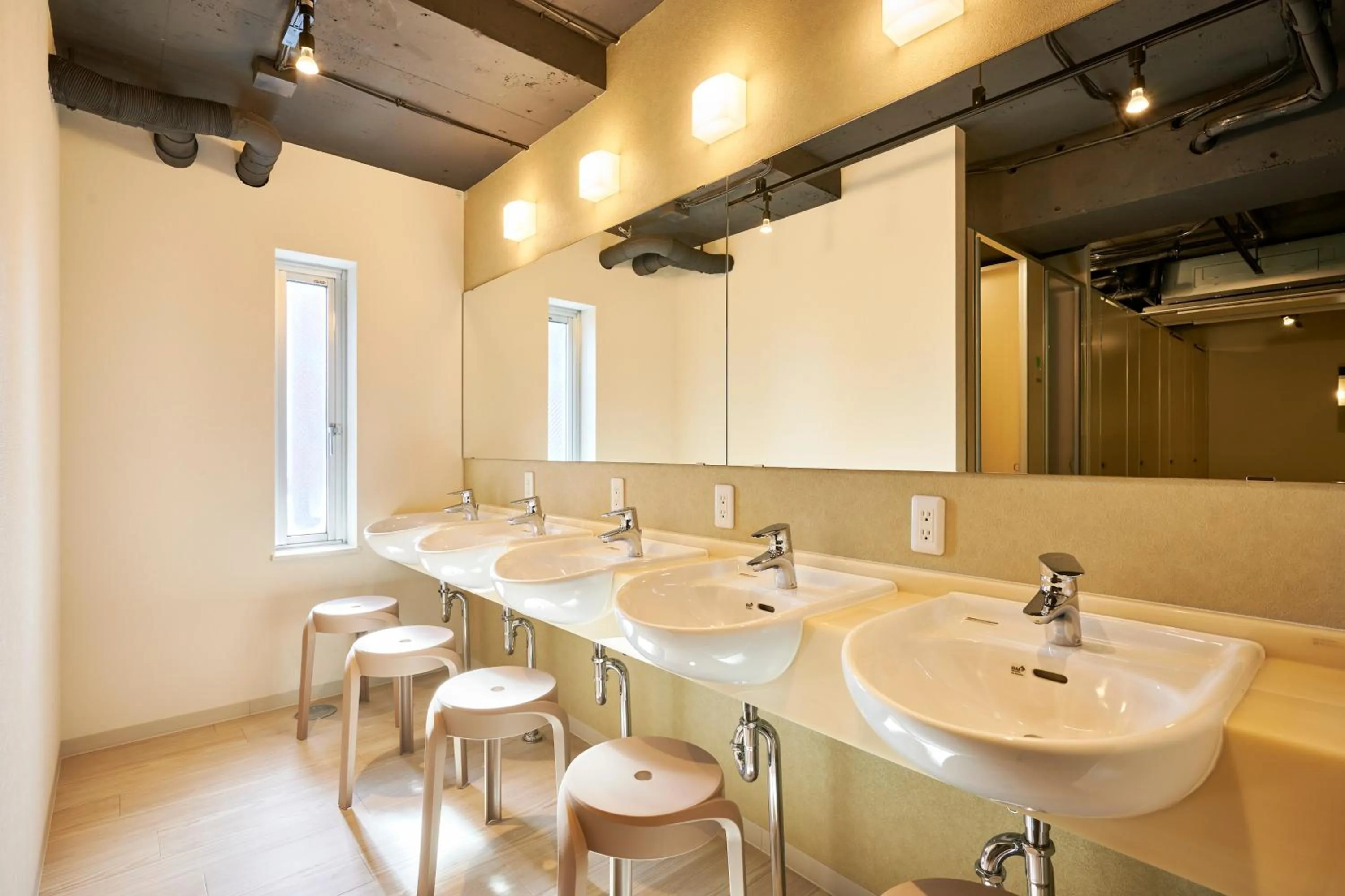 Toilet in CAPSULE HOTEL CONTINUE NijojoKita