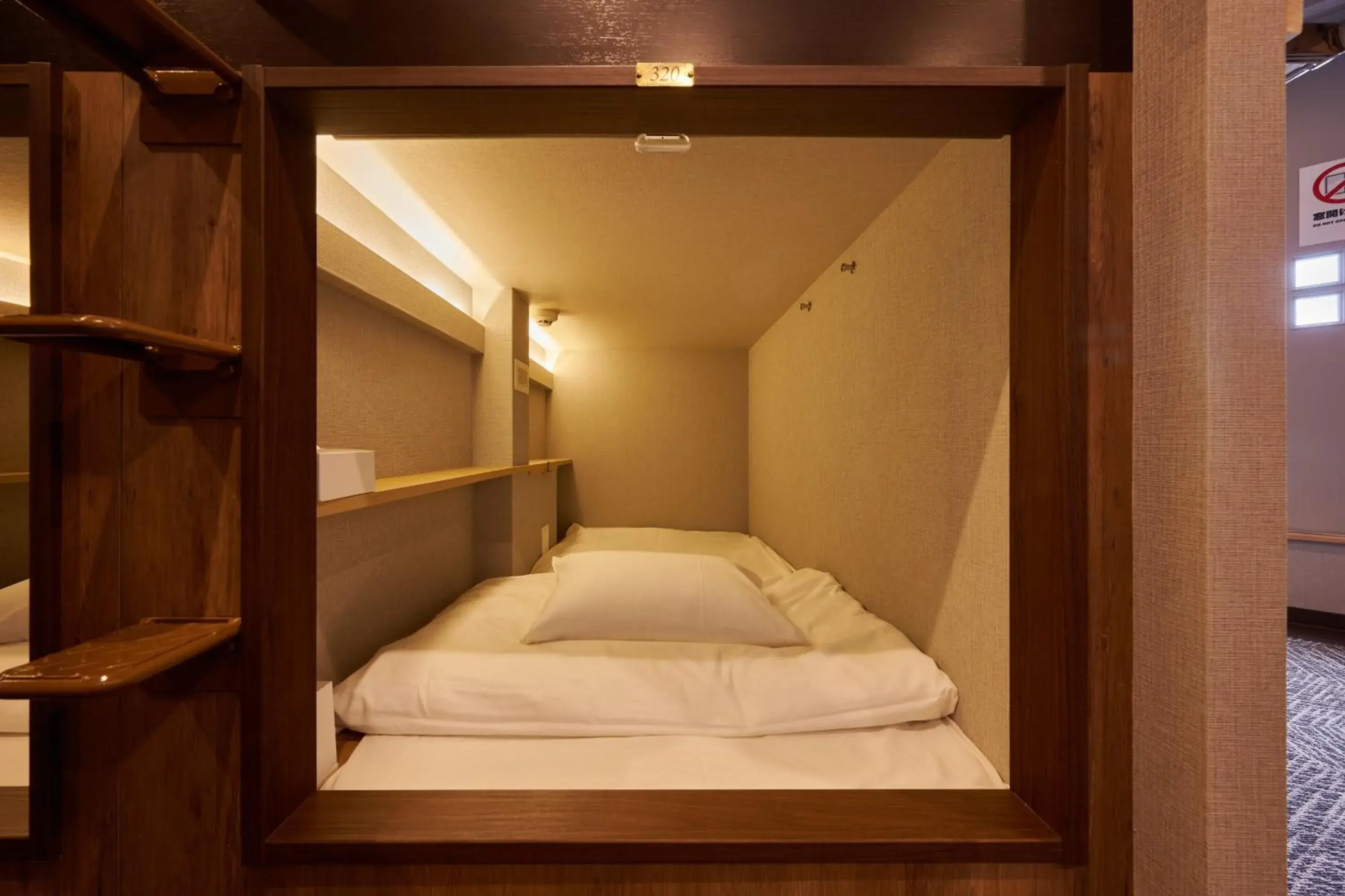 Bed in CAPSULE HOTEL CONTINUE NijojoKita Bed in CAPSULE HOTEL CONTINUE NijojoKita
