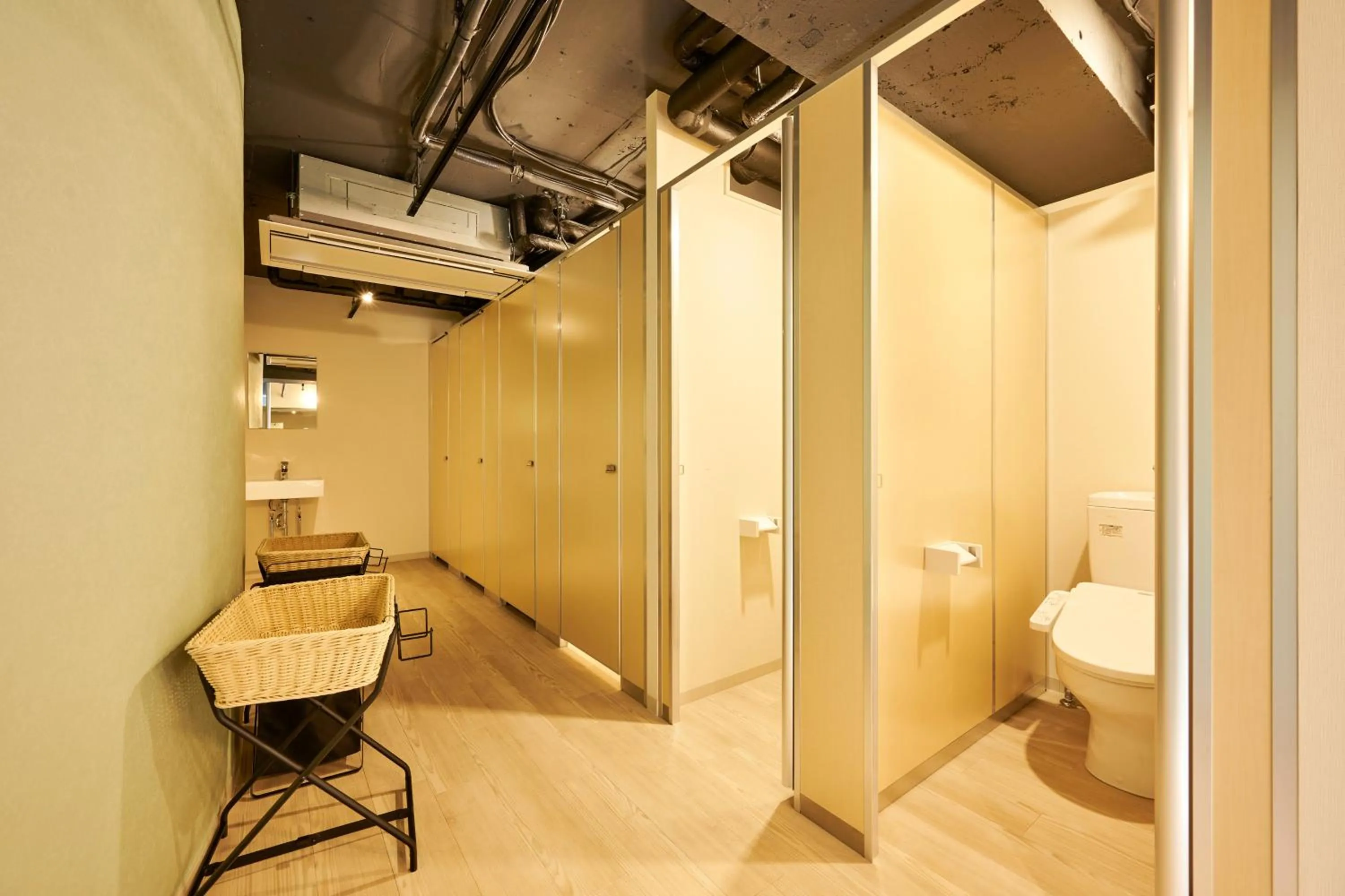 Toilet in CAPSULE HOTEL CONTINUE NijojoKita