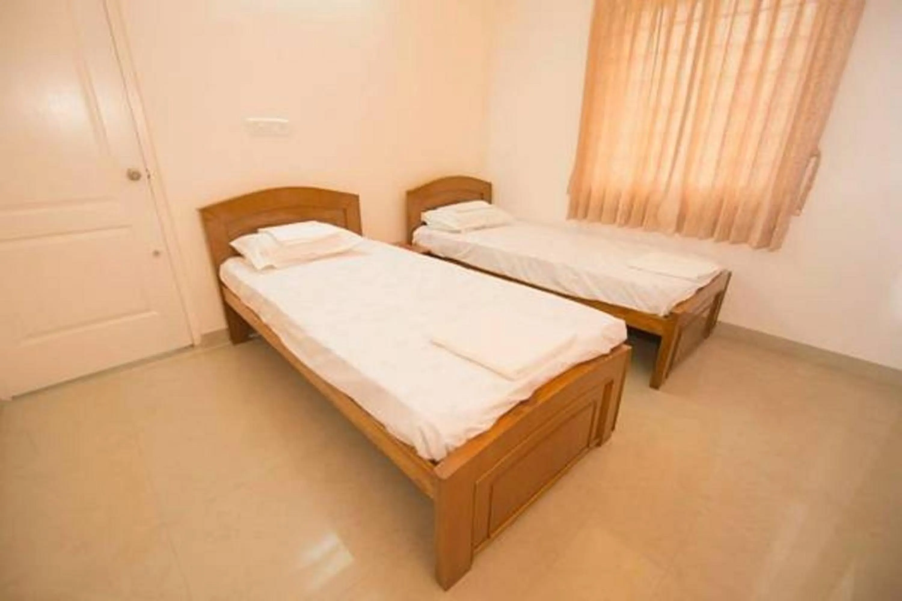 Bedroom, Bed in ThulasiRams Service Apartments