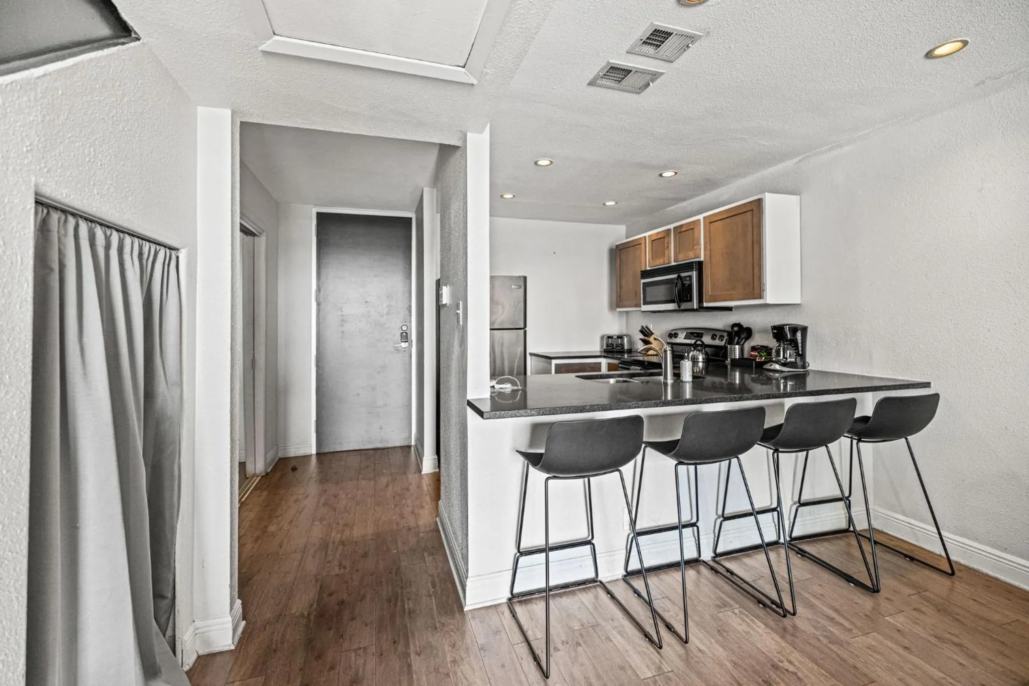 Kitchen or kitchenette in Littlefield Lofts, Hosted by Placemakr - 6th St
