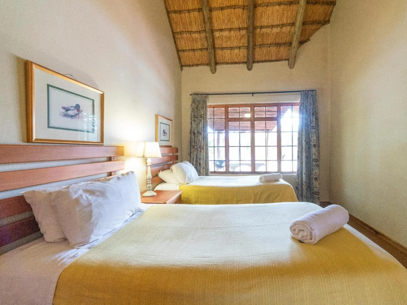 Photo of the whole room, Bed in Lake Naverone Holiday Cottages