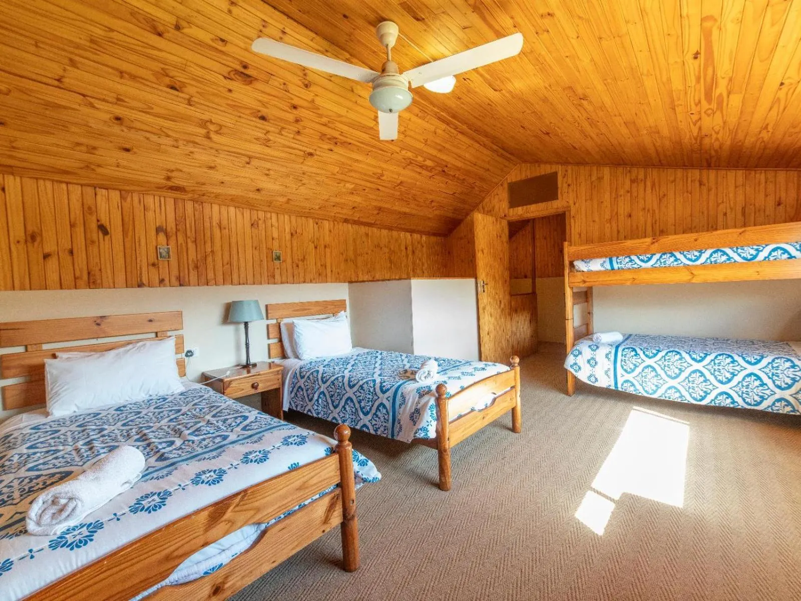 Photo of the whole room, Bed in Lake Naverone Holiday Cottages