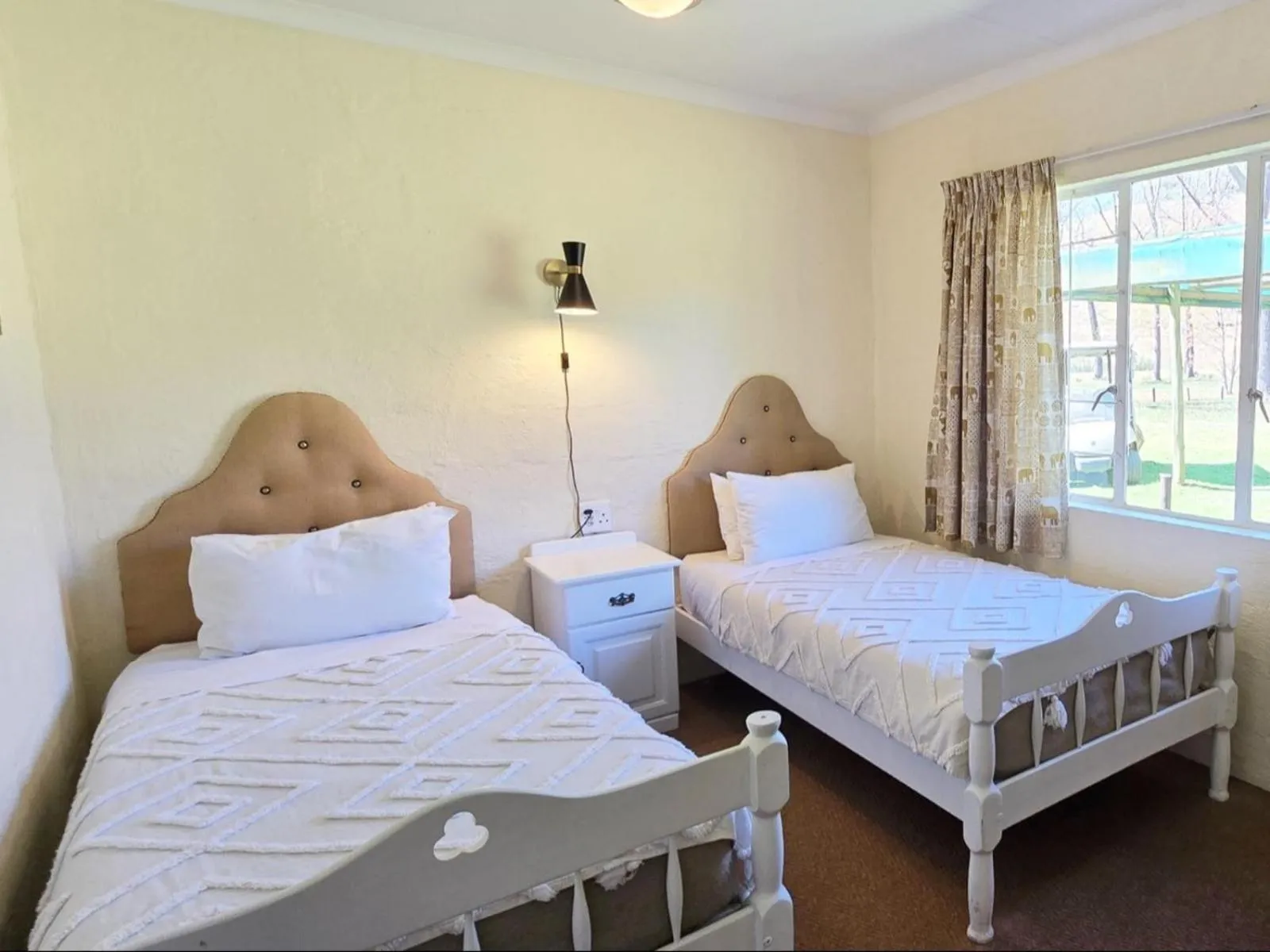 Photo of the whole room, Bed in Lake Naverone Holiday Cottages