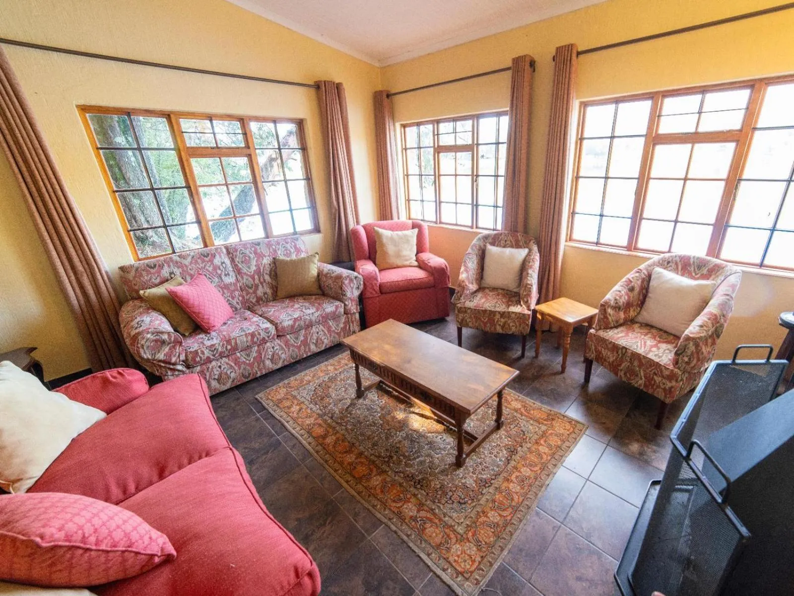 Seating area in Lake Naverone Holiday Cottages