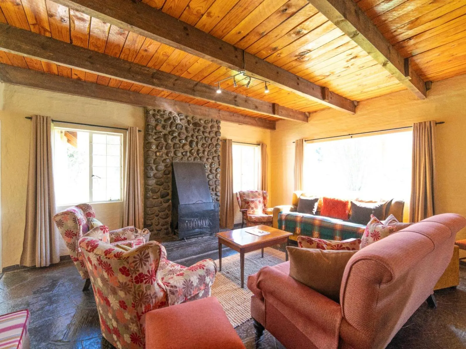 Seating area in Lake Naverone Holiday Cottages