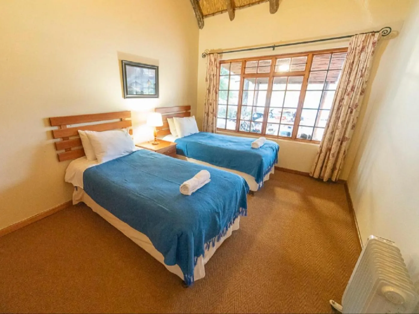 Bed in Lake Naverone Holiday Cottages