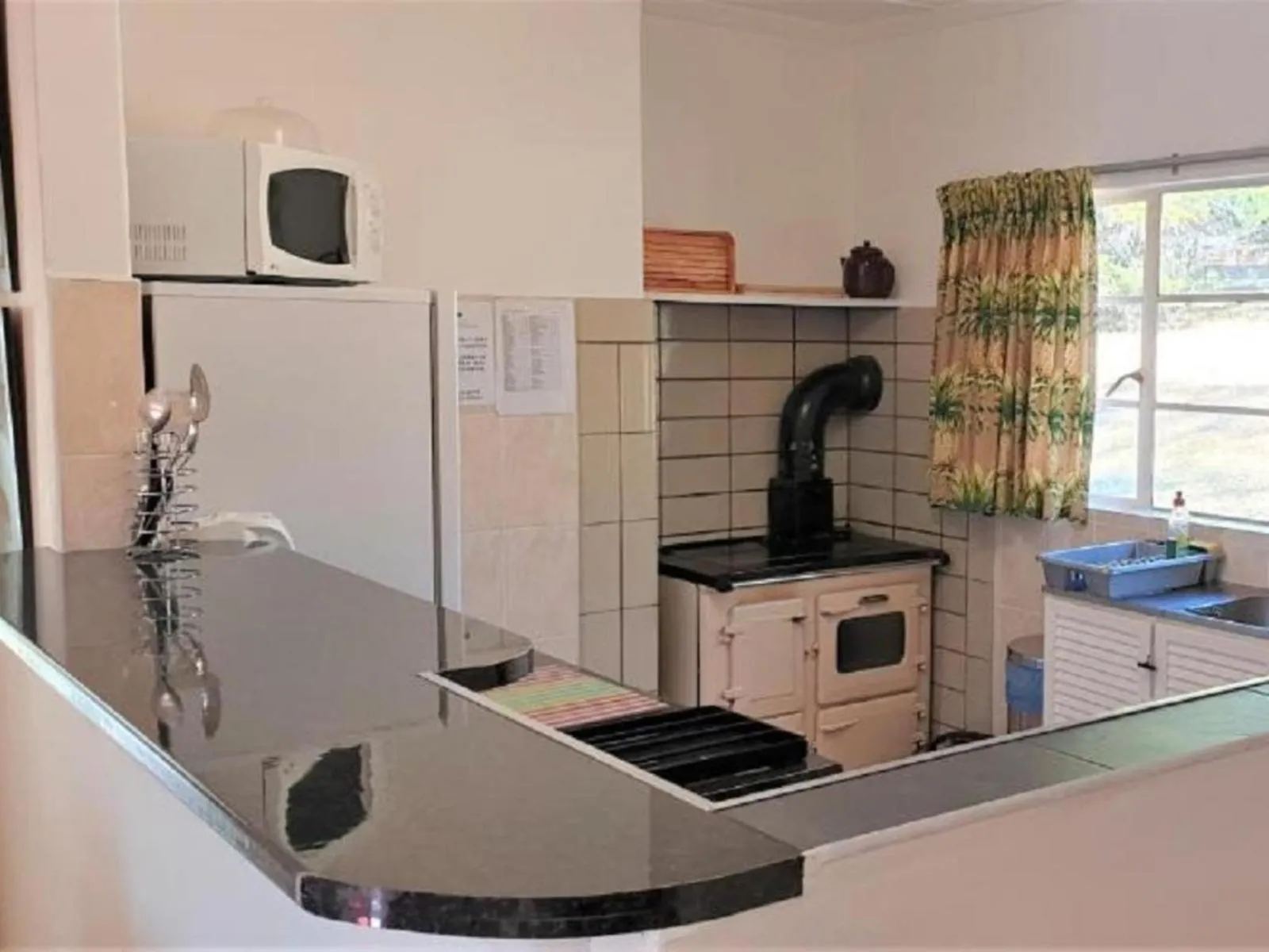 Kitchen or kitchenette in Lake Naverone Holiday Cottages