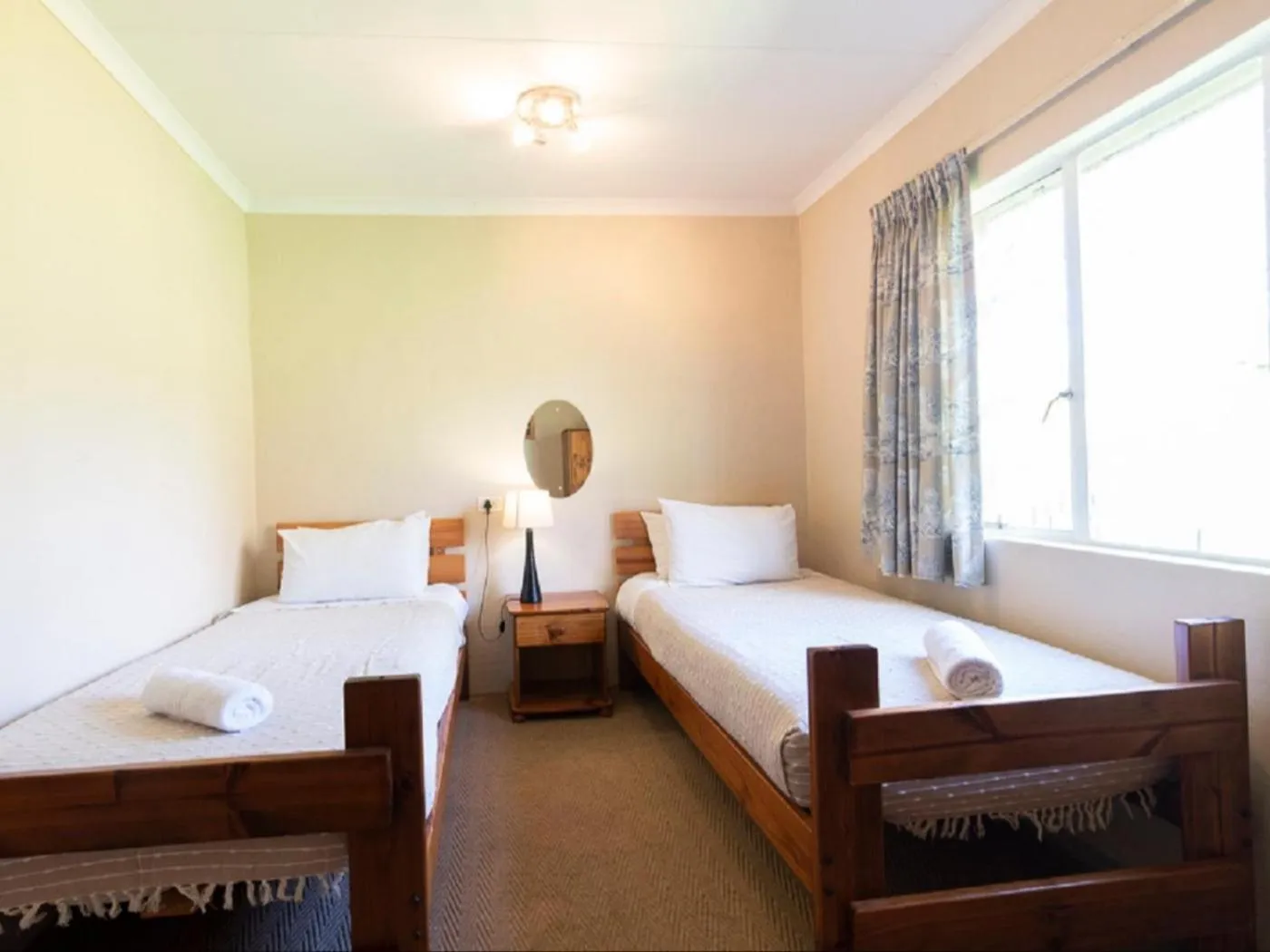 Bed in Lake Naverone Holiday Cottages