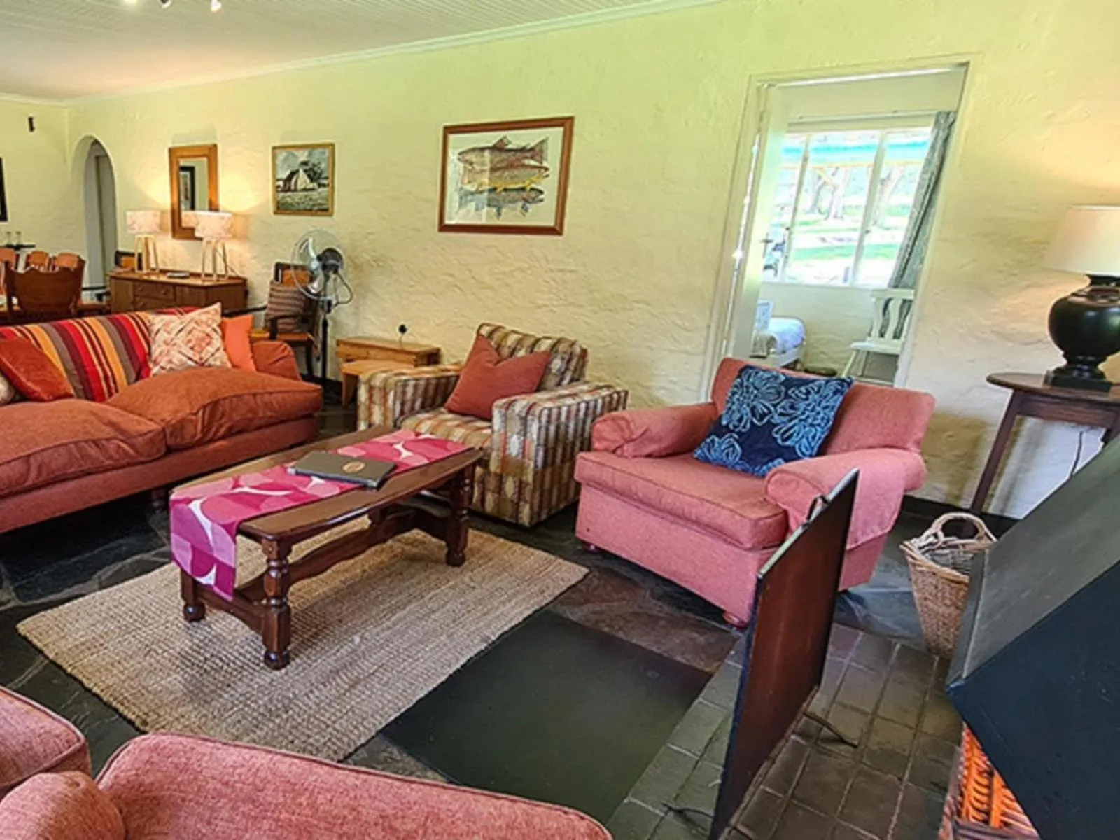Seating area in Lake Naverone Holiday Cottages