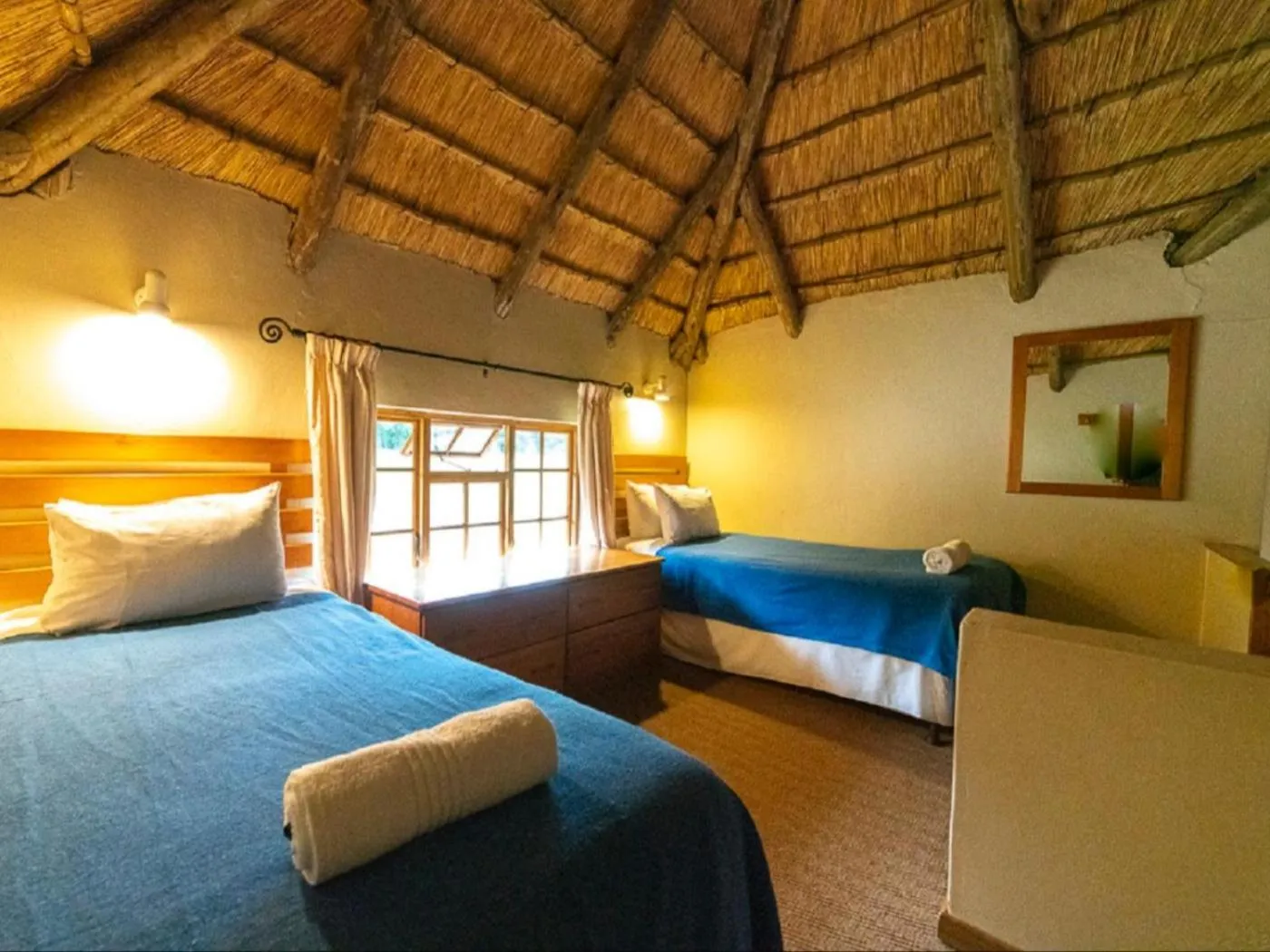 Bed in Lake Naverone Holiday Cottages