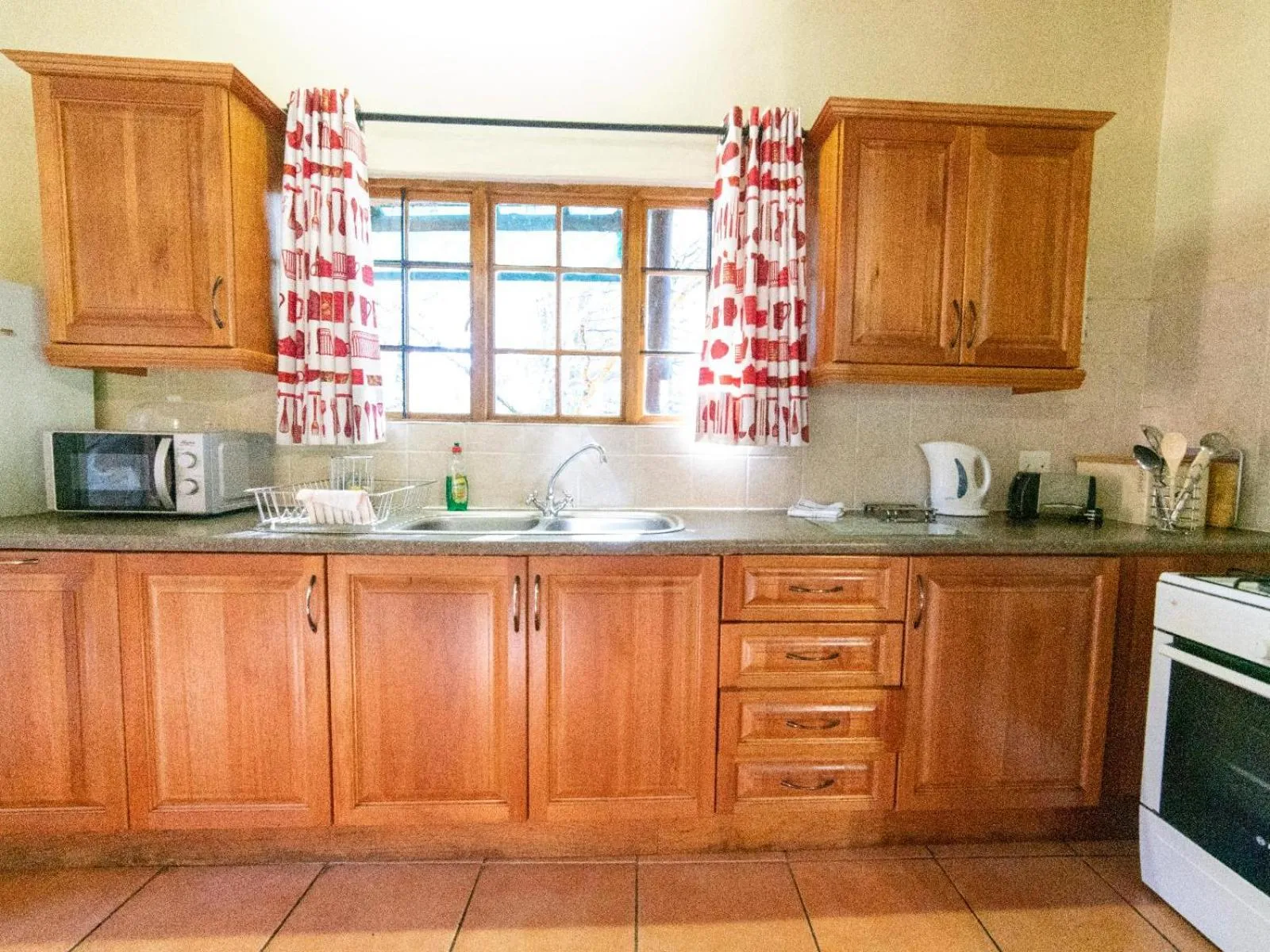 Kitchen or kitchenette in Lake Naverone Holiday Cottages