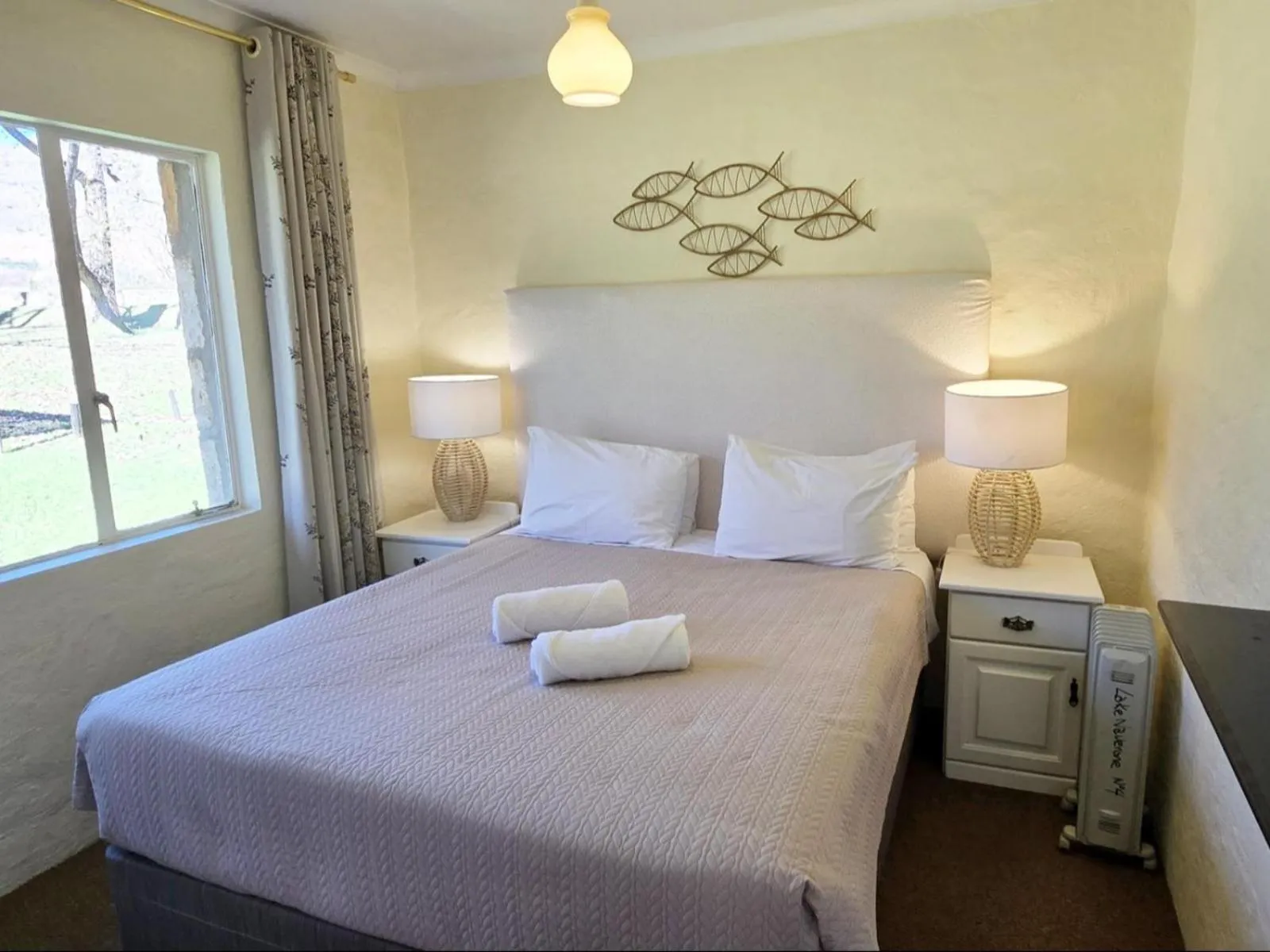 Photo of the whole room, Bed in Lake Naverone Holiday Cottages