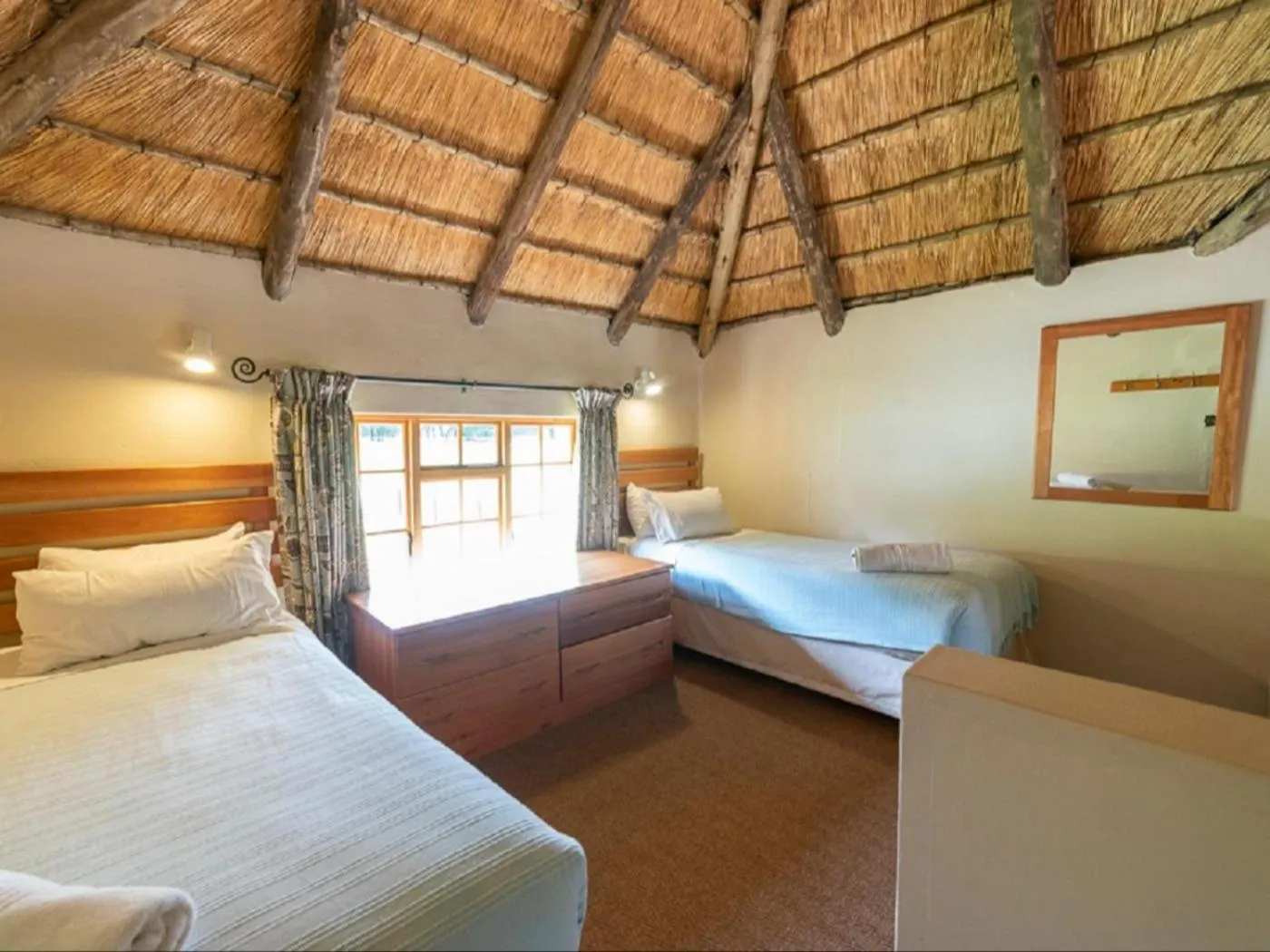 Bed in Lake Naverone Holiday Cottages