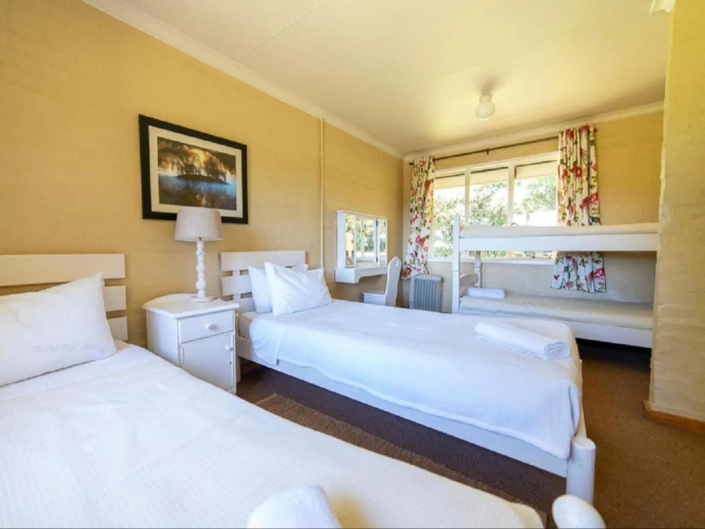 Bed in Lake Naverone Holiday Cottages