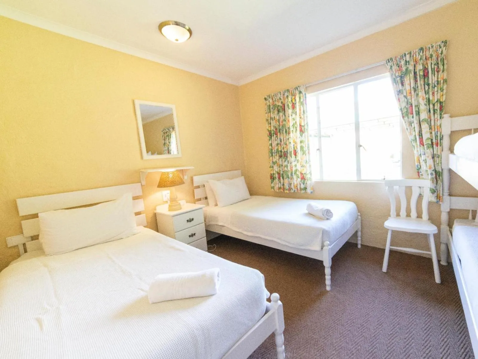 Photo of the whole room, Bed in Lake Naverone Holiday Cottages