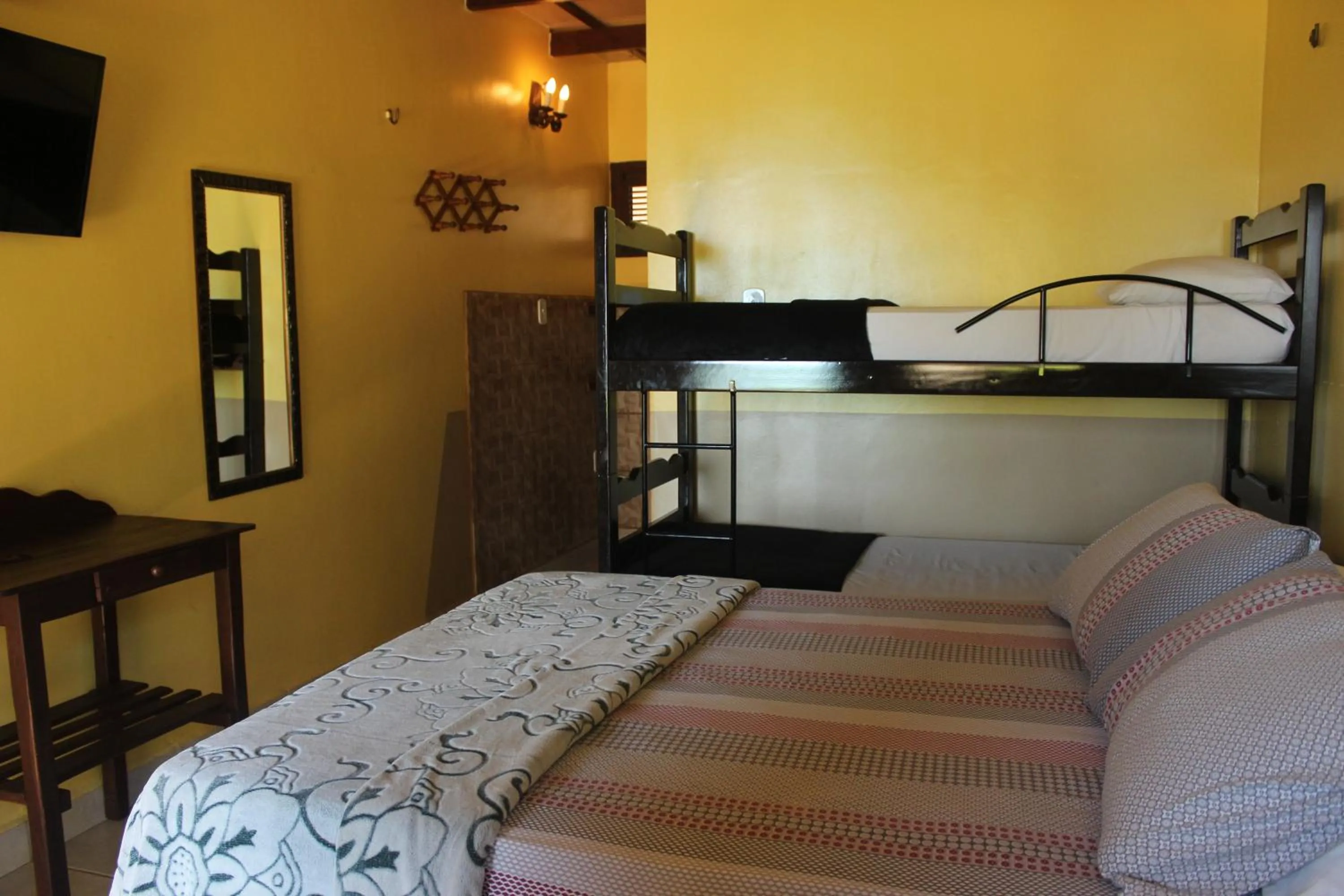 Bed in Pousada Mundial
