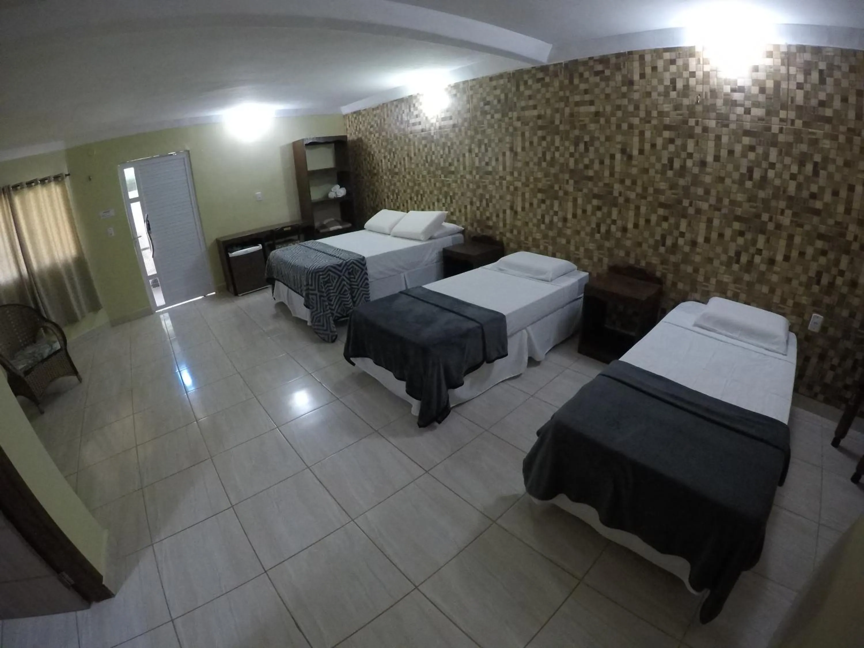 Bed in Pousada Mundial