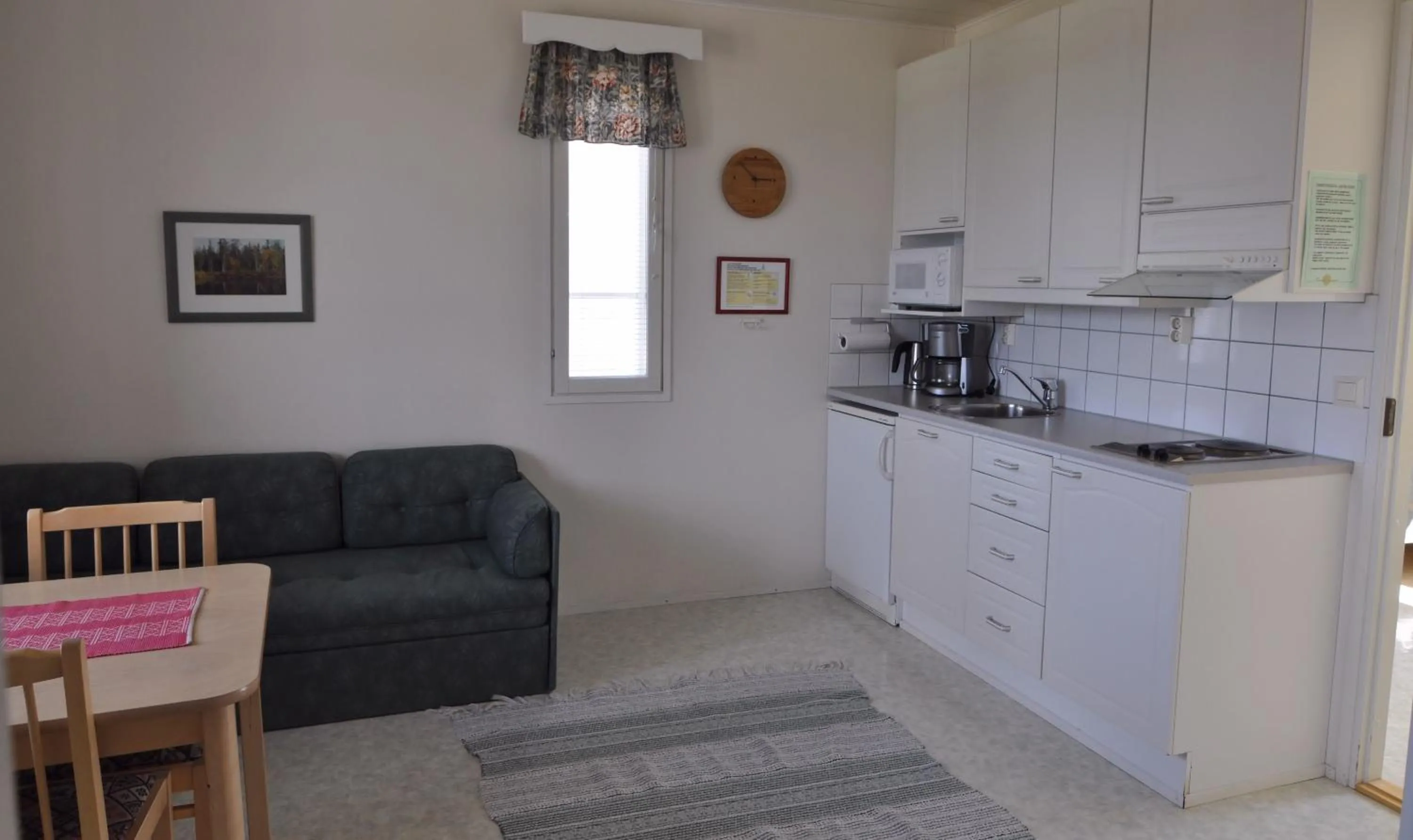 Kitchen or kitchenette in Lomamaja Pekonen Apartments