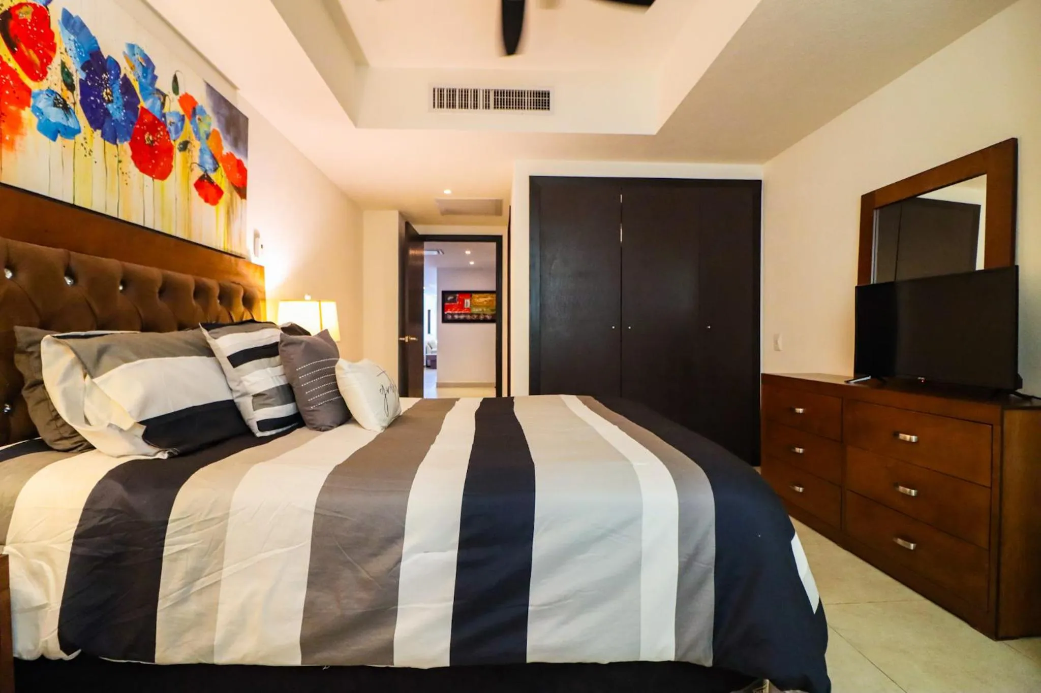 Bed in Grand Venetian Beachfront Condo
