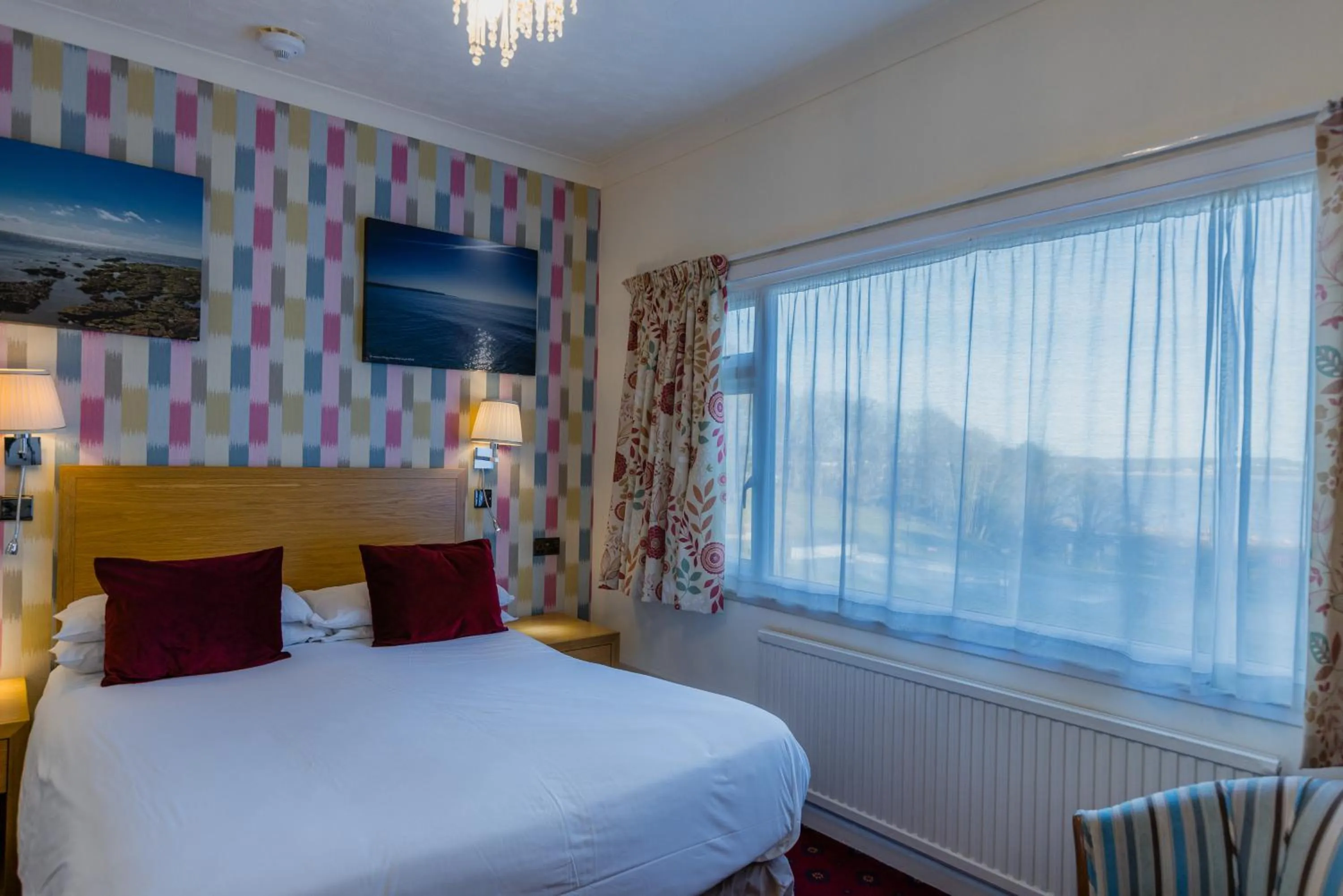 Bed in Langstone Cliff Hotel