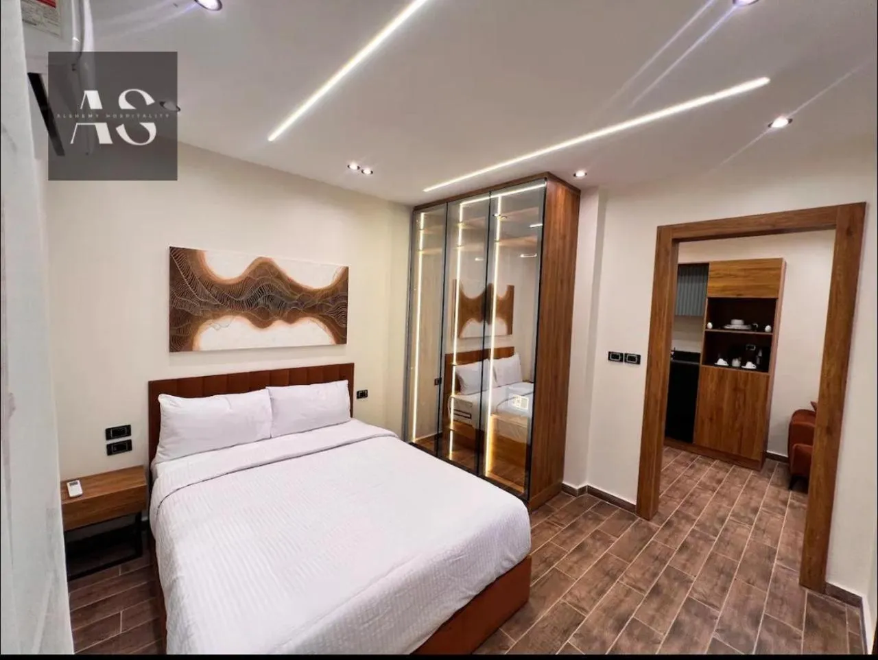 Bed in Elite Boutique Hotel