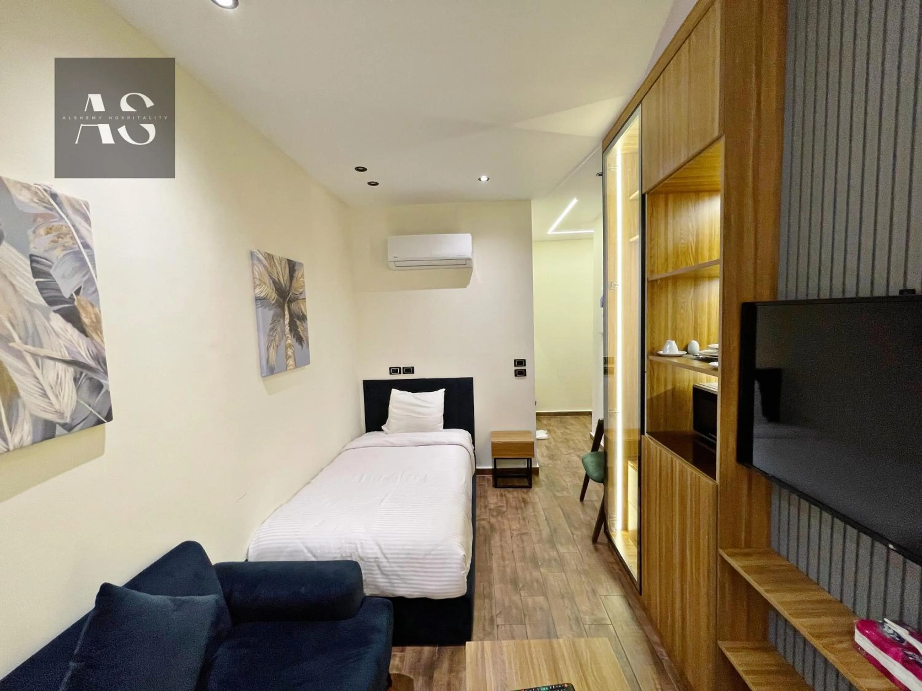 Bed in Elite Boutique Hotel