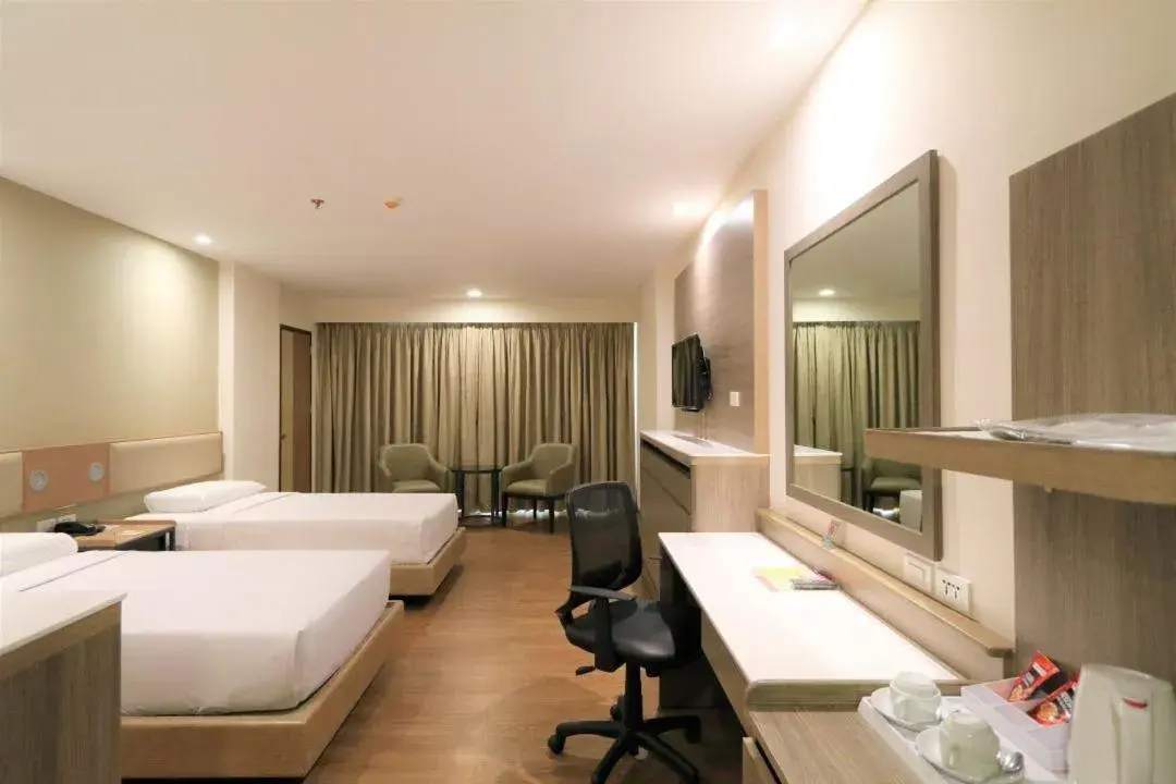 Bed in Garden Orchid Hotel & Resort Corp. Bed in Garden Orchid Hotel & Resort Corp.