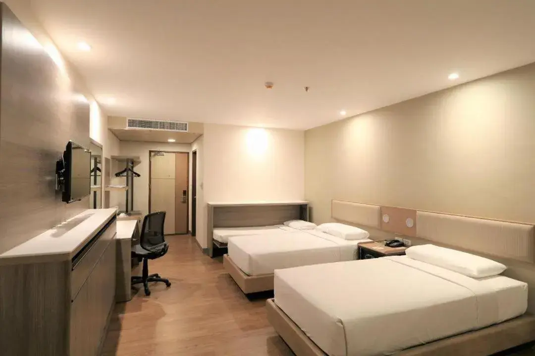 Bed in Garden Orchid Hotel & Resort Corp. Bed in Garden Orchid Hotel & Resort Corp.