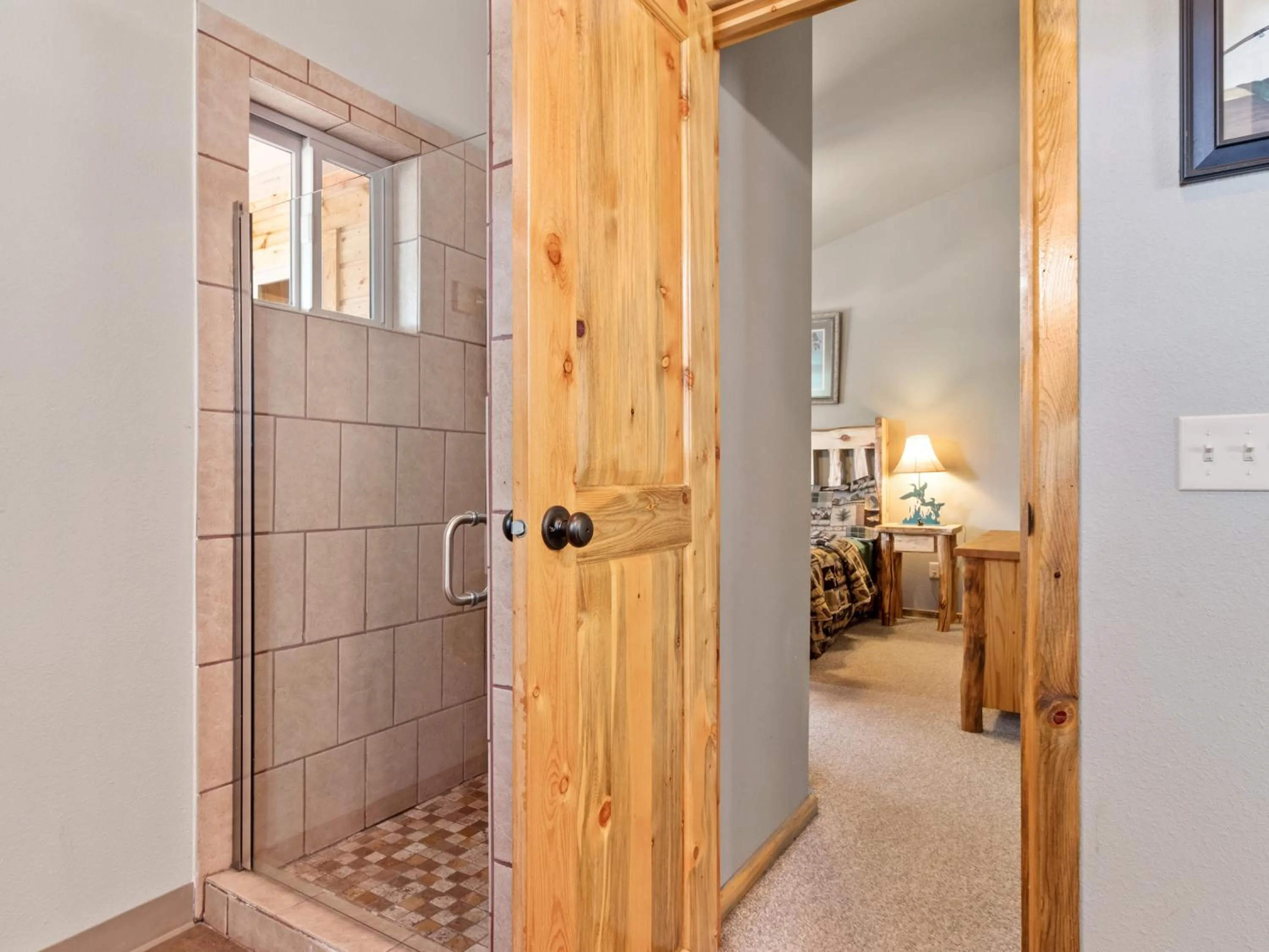 Bathroom, Bed in Pine Haven Resort
