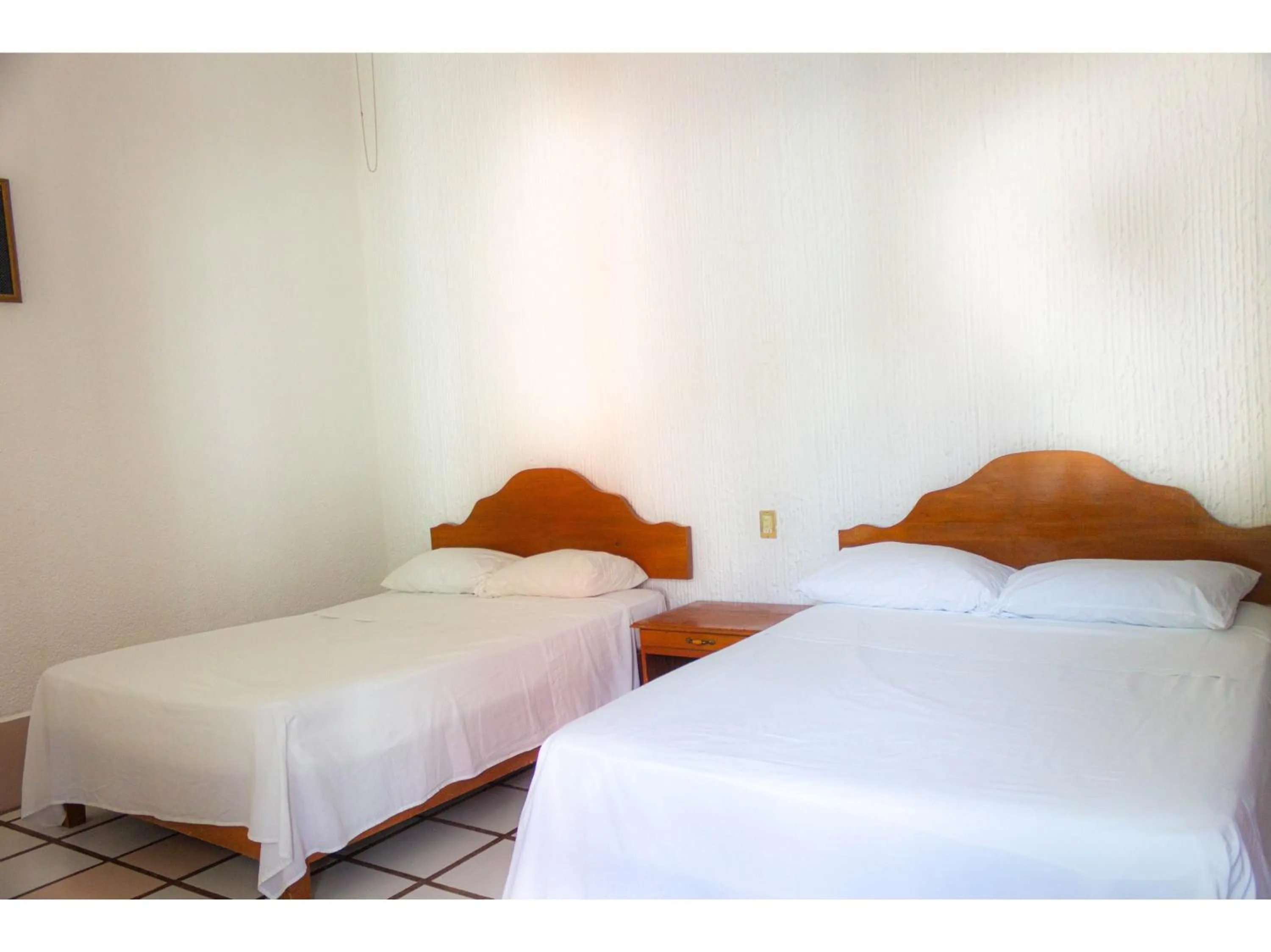 Bedroom in OYO Hotel San Felipe Inn