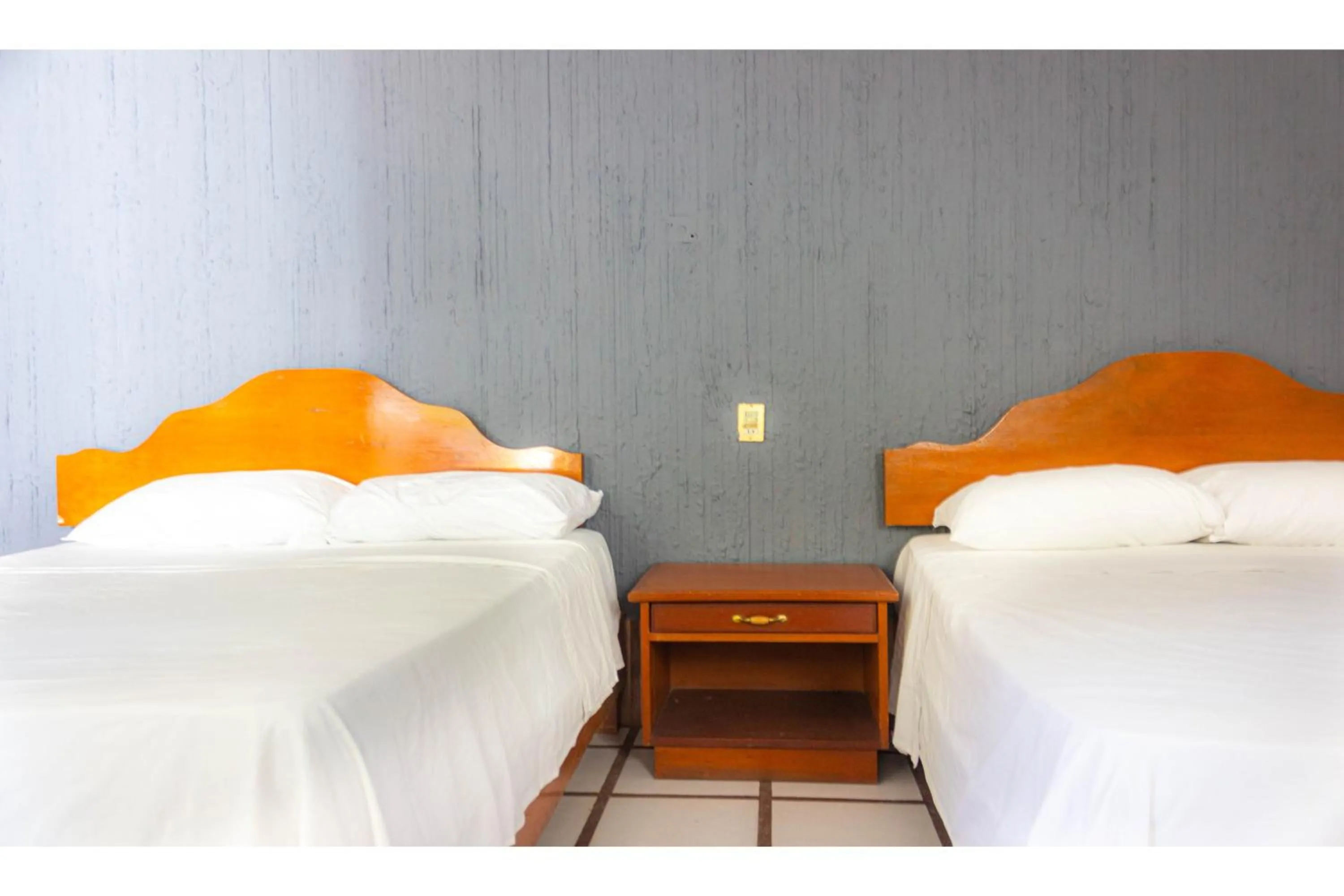 Bedroom in OYO Hotel San Felipe Inn