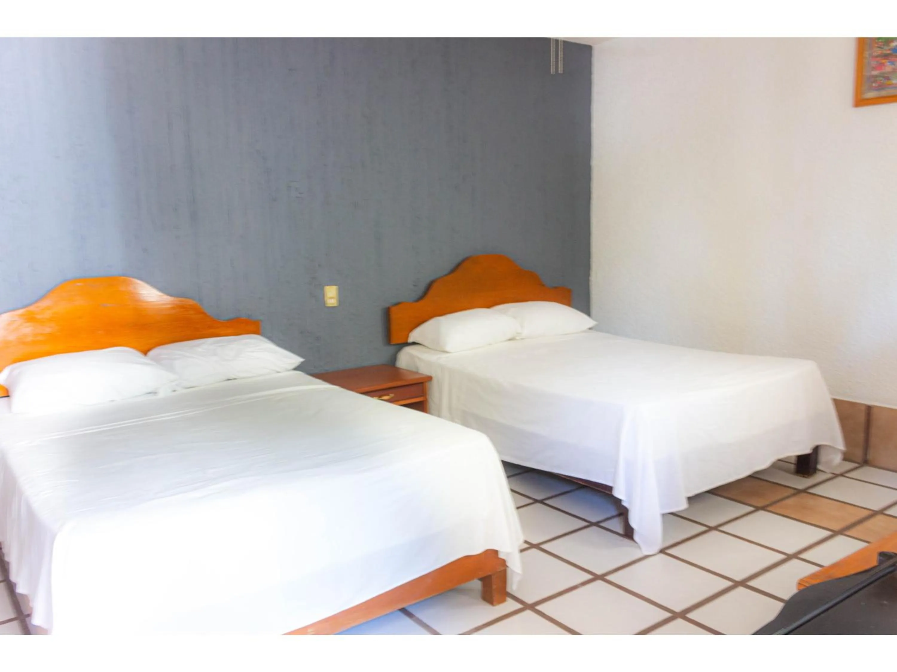 Bedroom in OYO Hotel San Felipe Inn