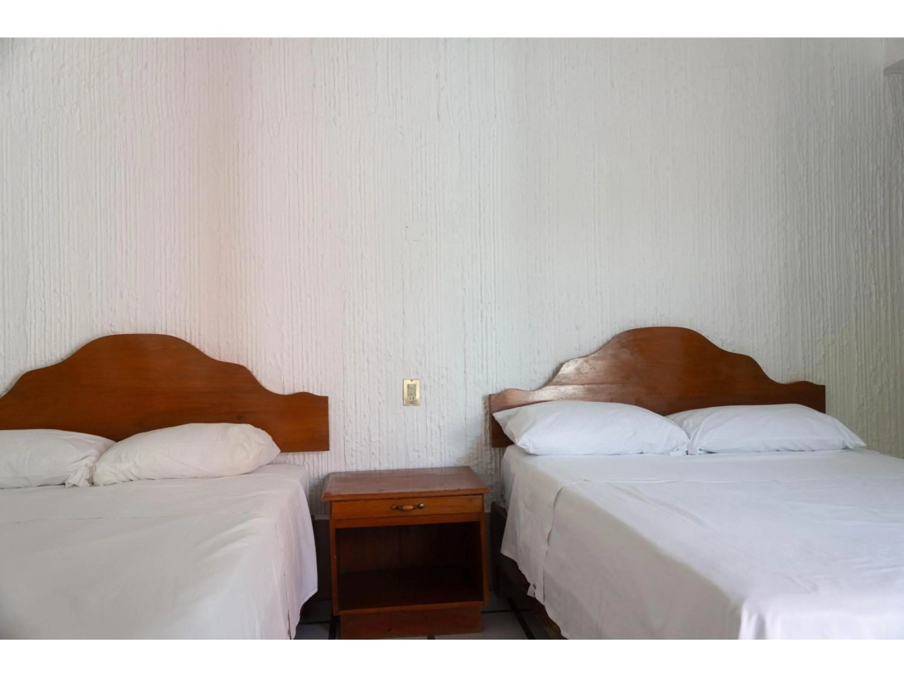 Bedroom in OYO Hotel San Felipe Inn