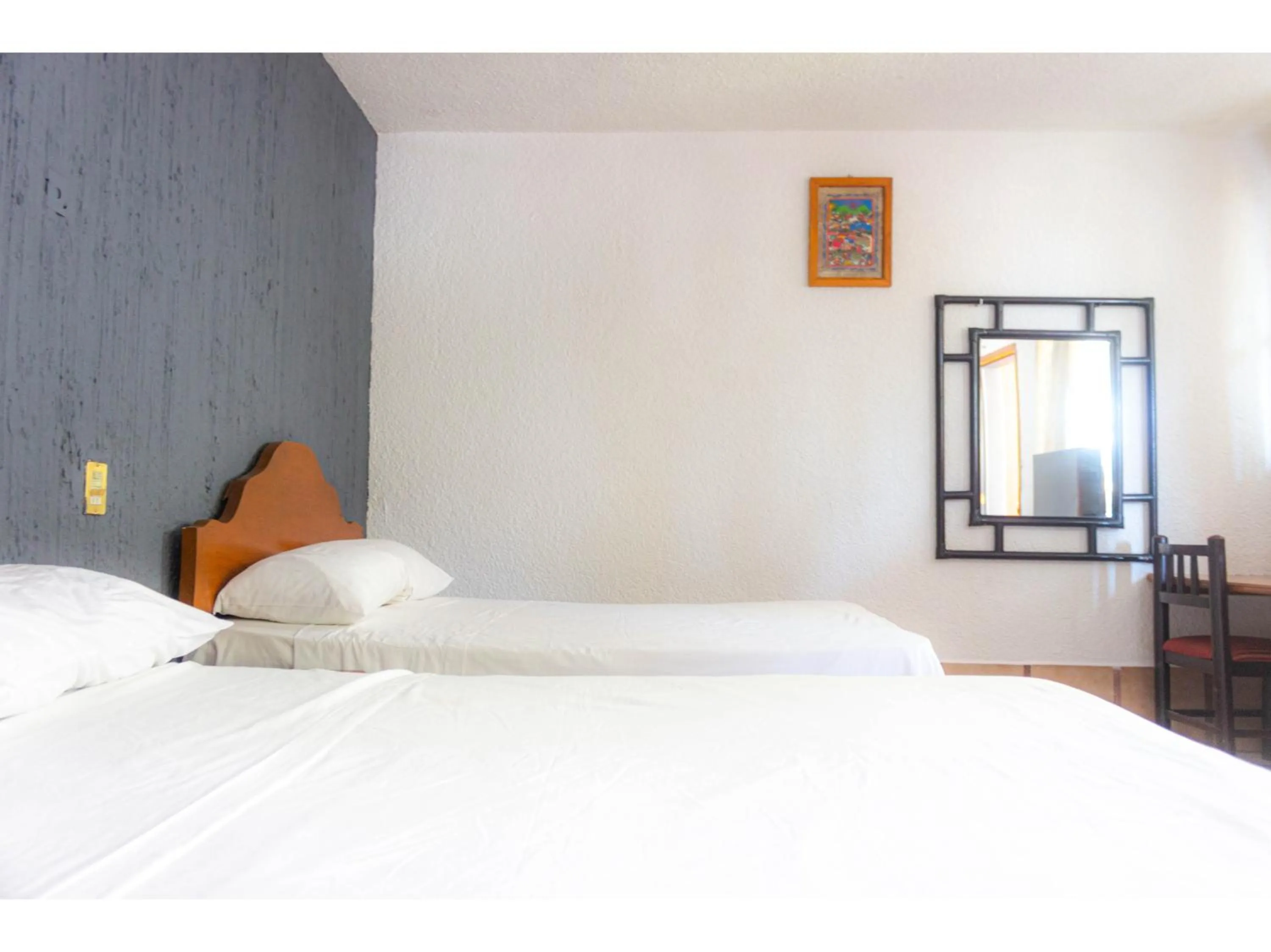 Bedroom in OYO Hotel San Felipe Inn