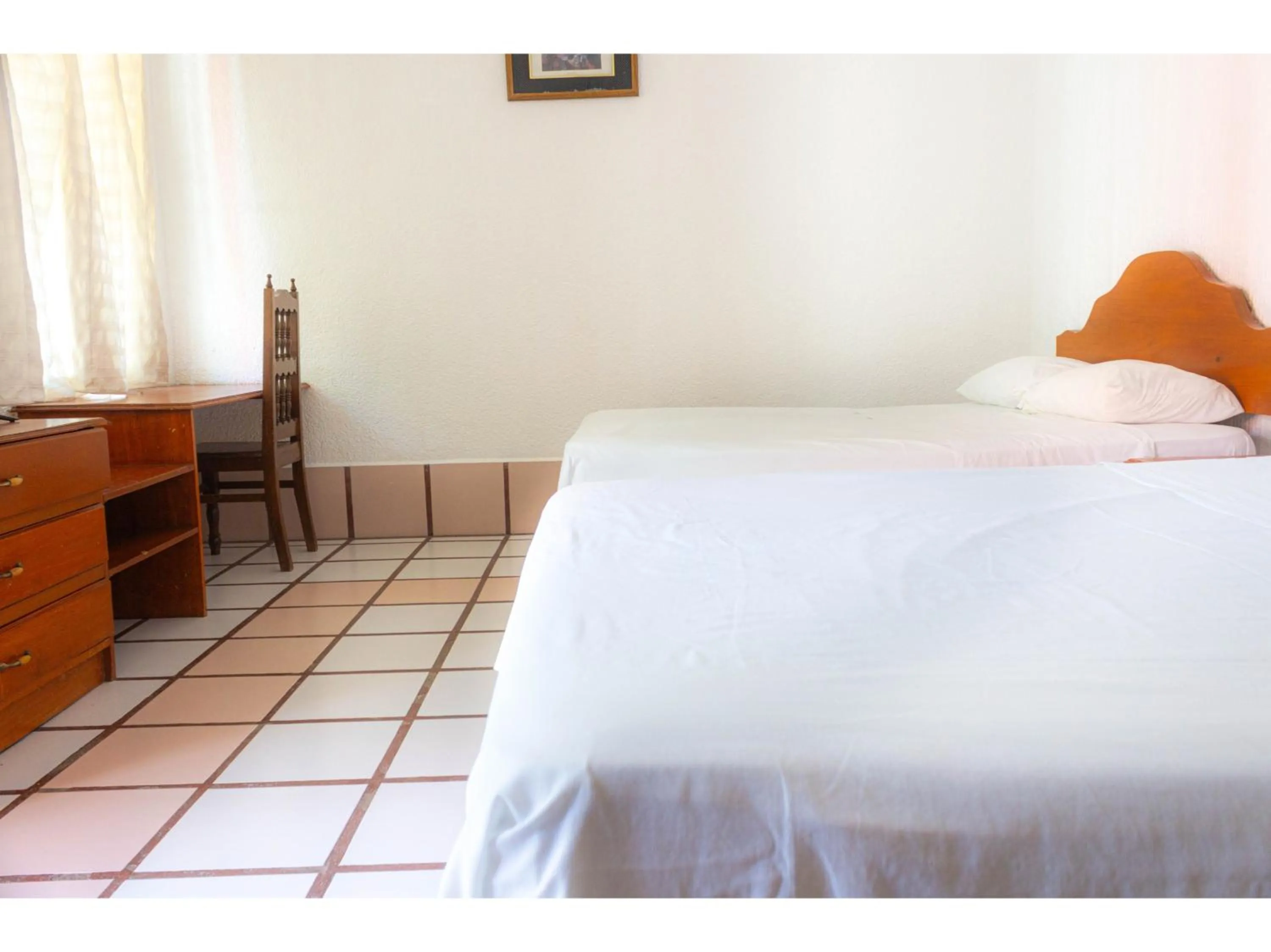 Bedroom in OYO Hotel San Felipe Inn