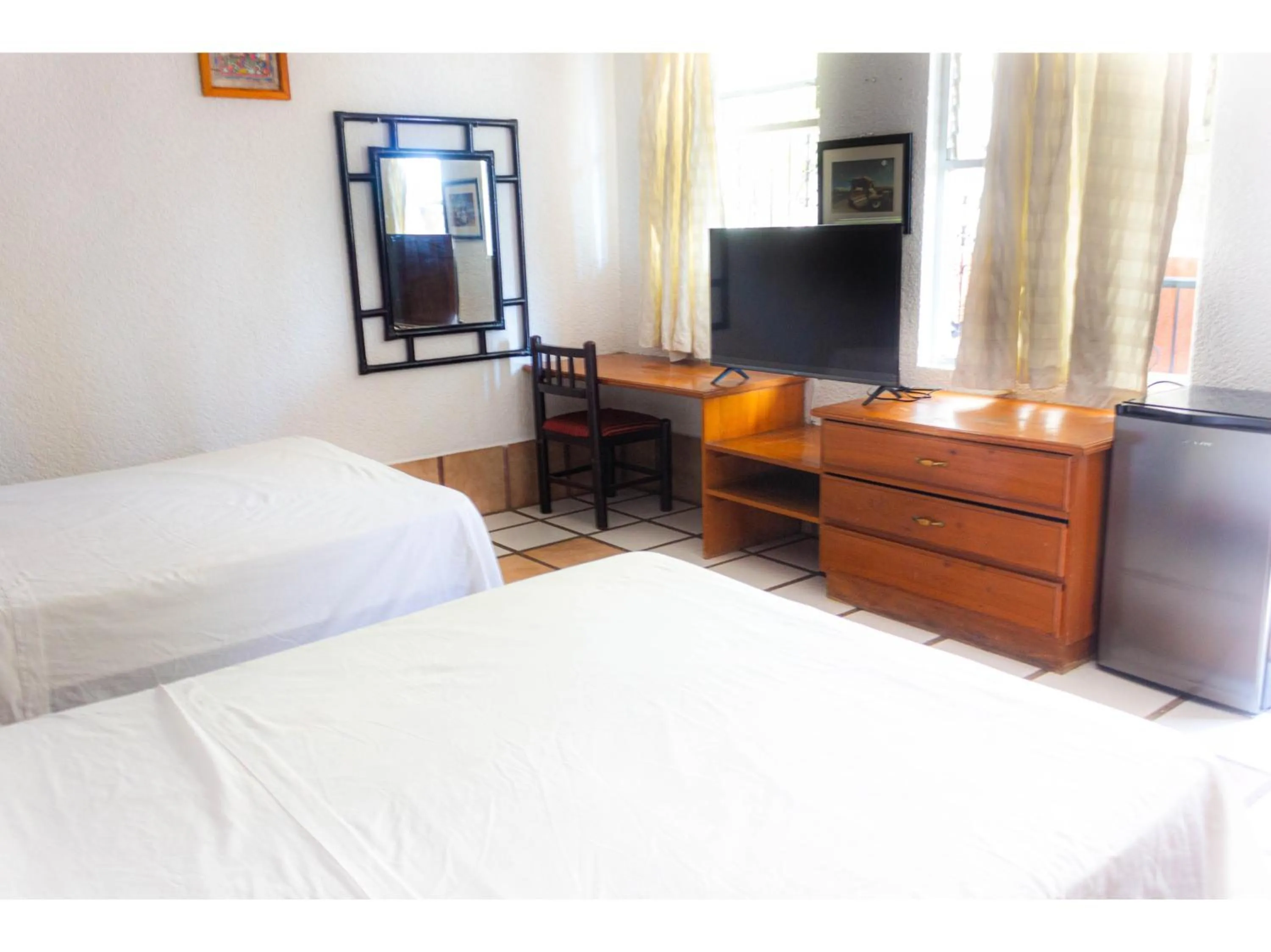 Bedroom in OYO Hotel San Felipe Inn