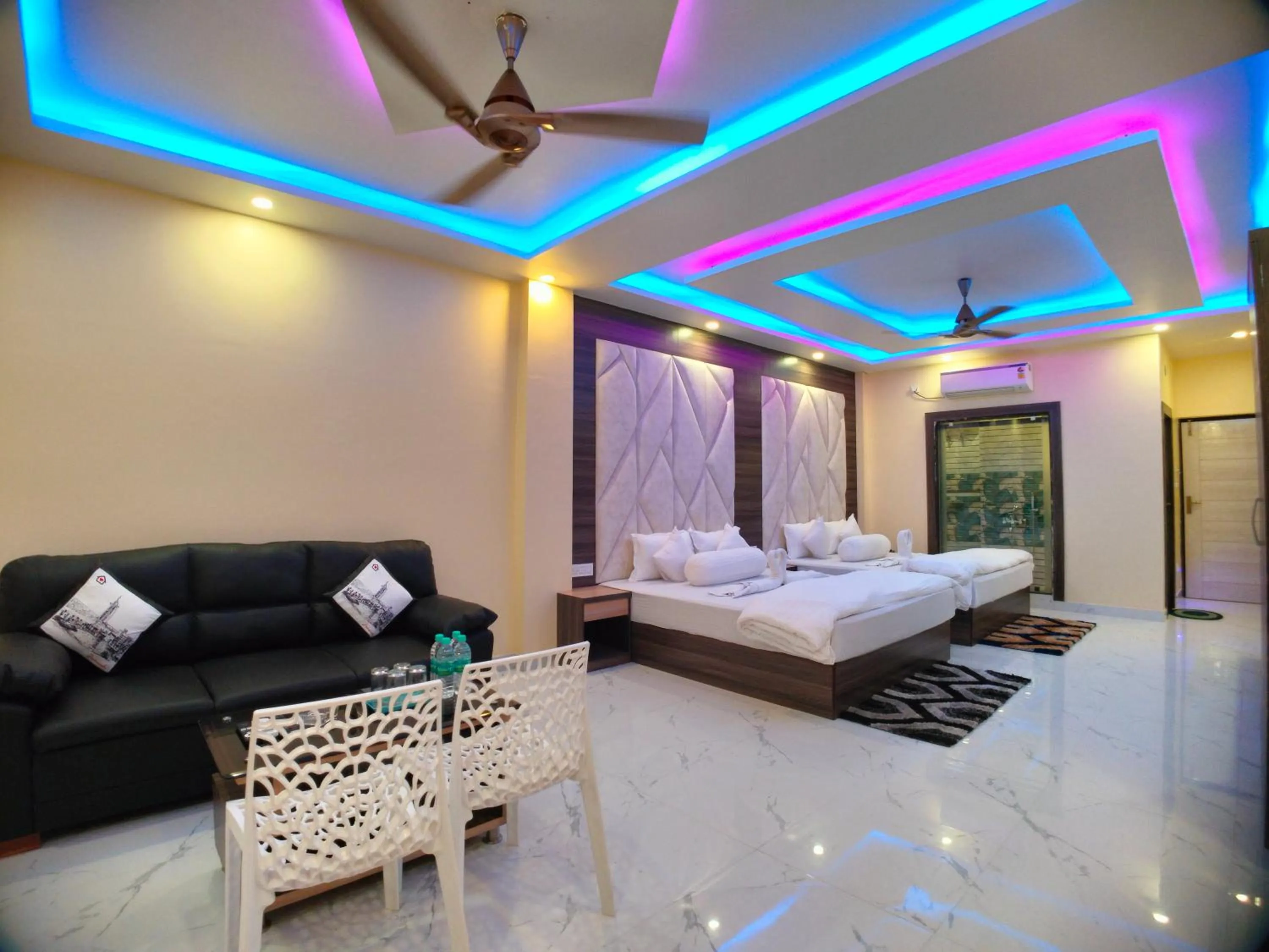 Bed in The Triton Beach Resort