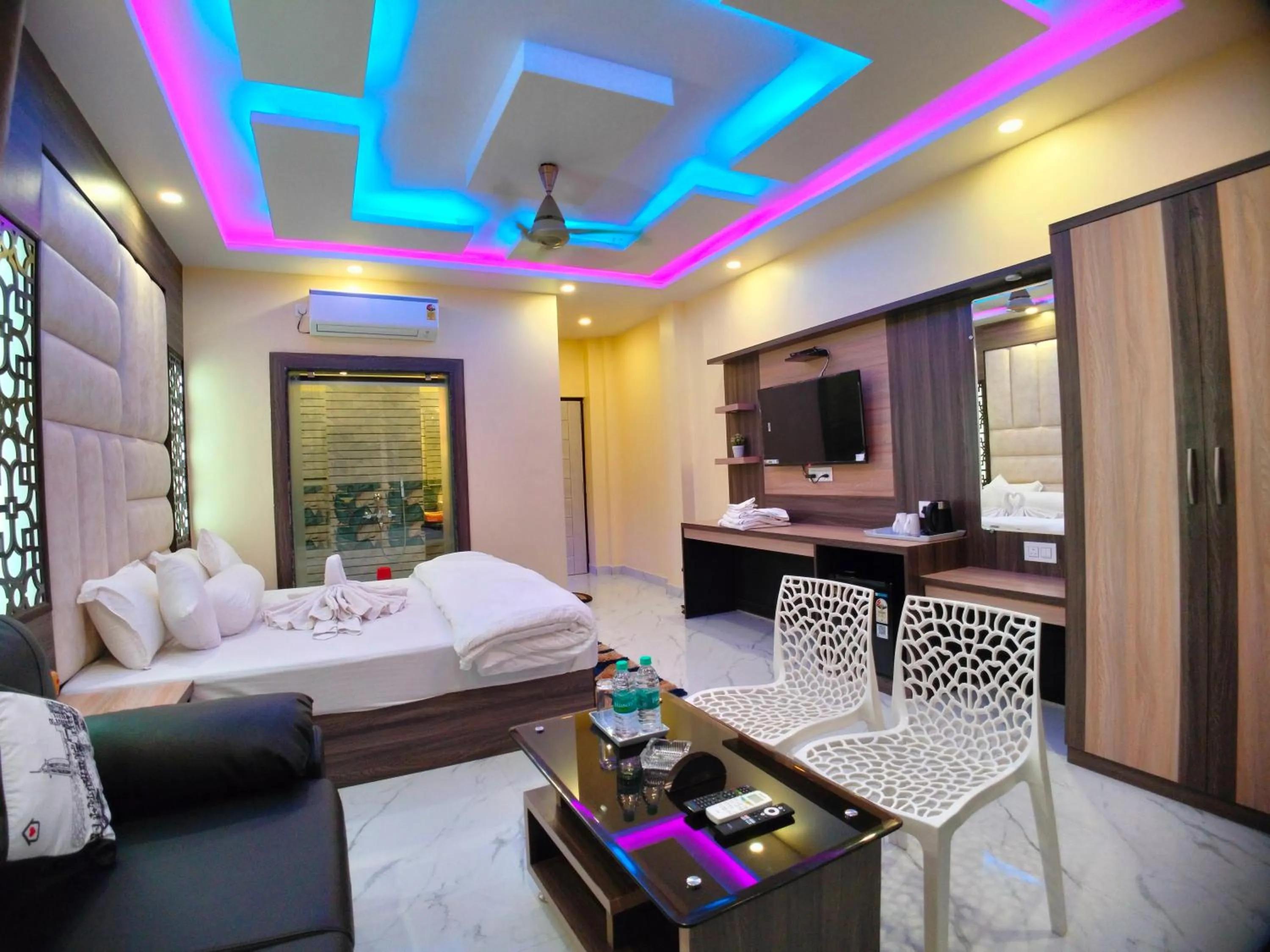 Bed in The Triton Beach Resort