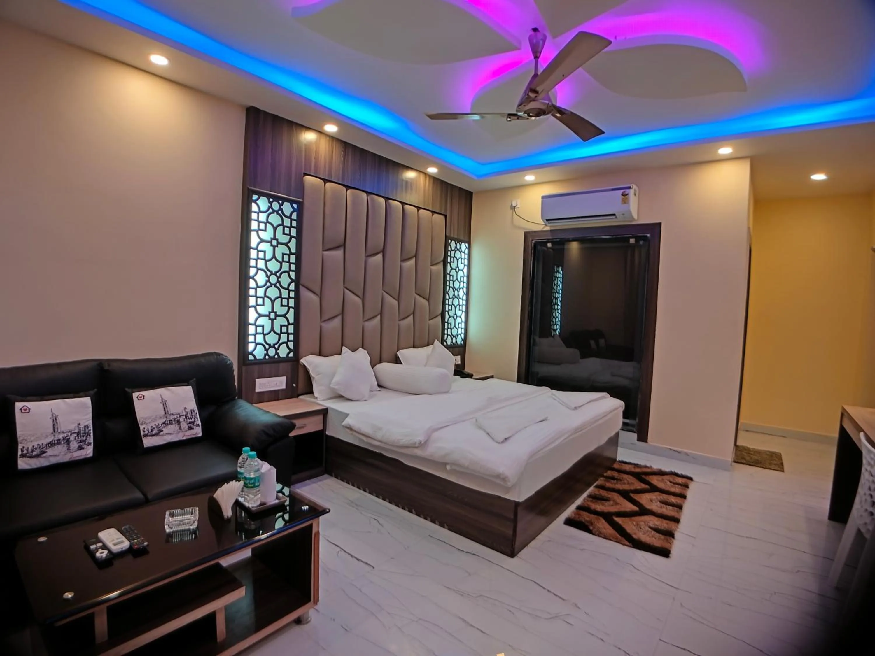 Photo of the whole room, Bed in The Triton Beach Resort