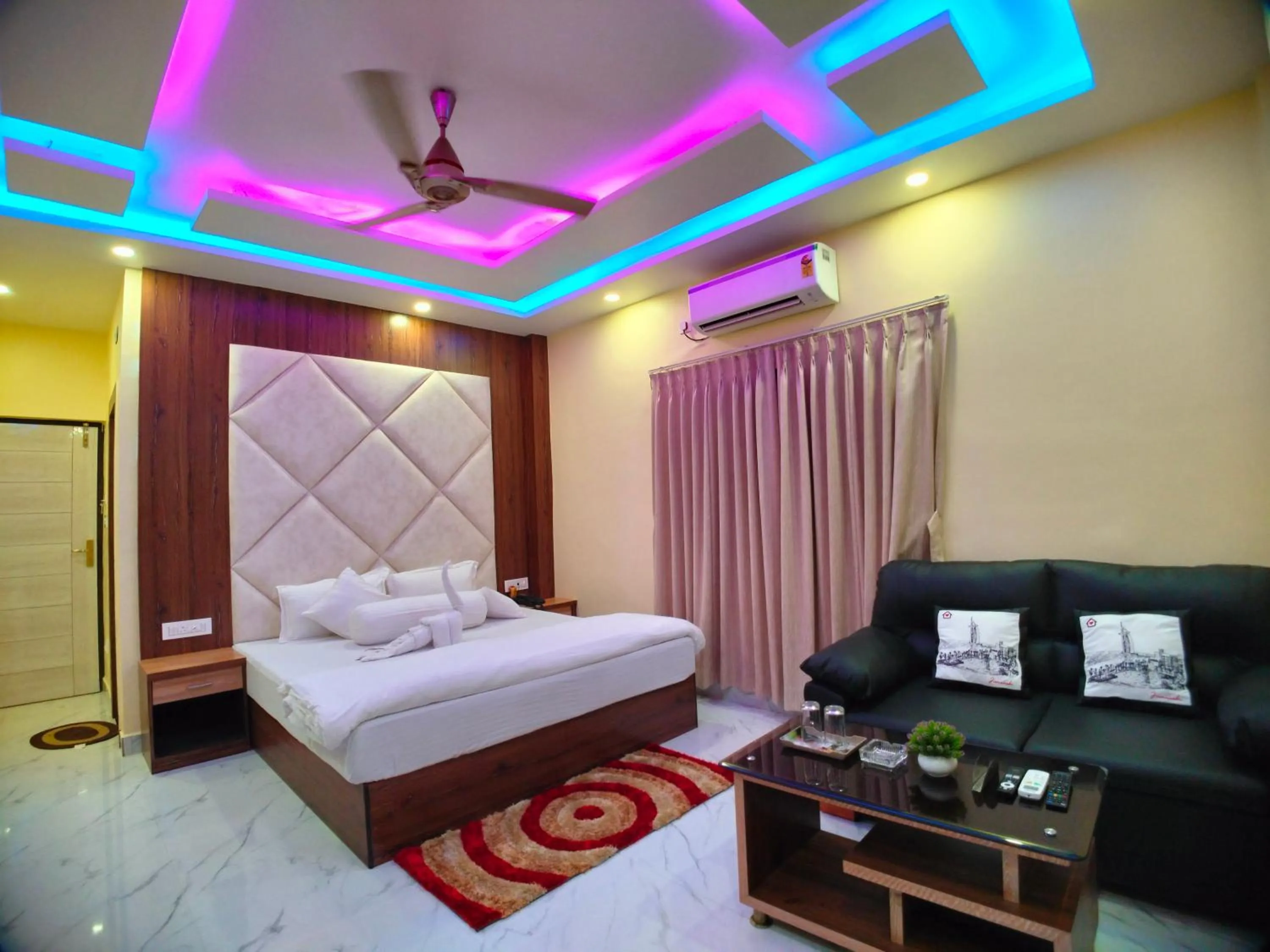 Bed in The Triton Beach Resort