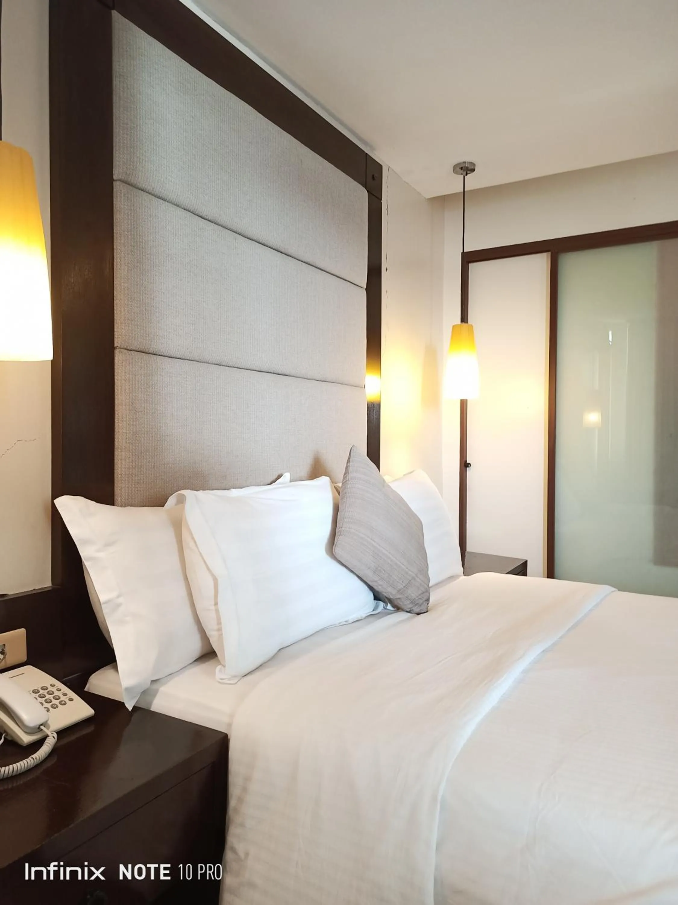 Bed in Coron Gateway Hotel & Suites