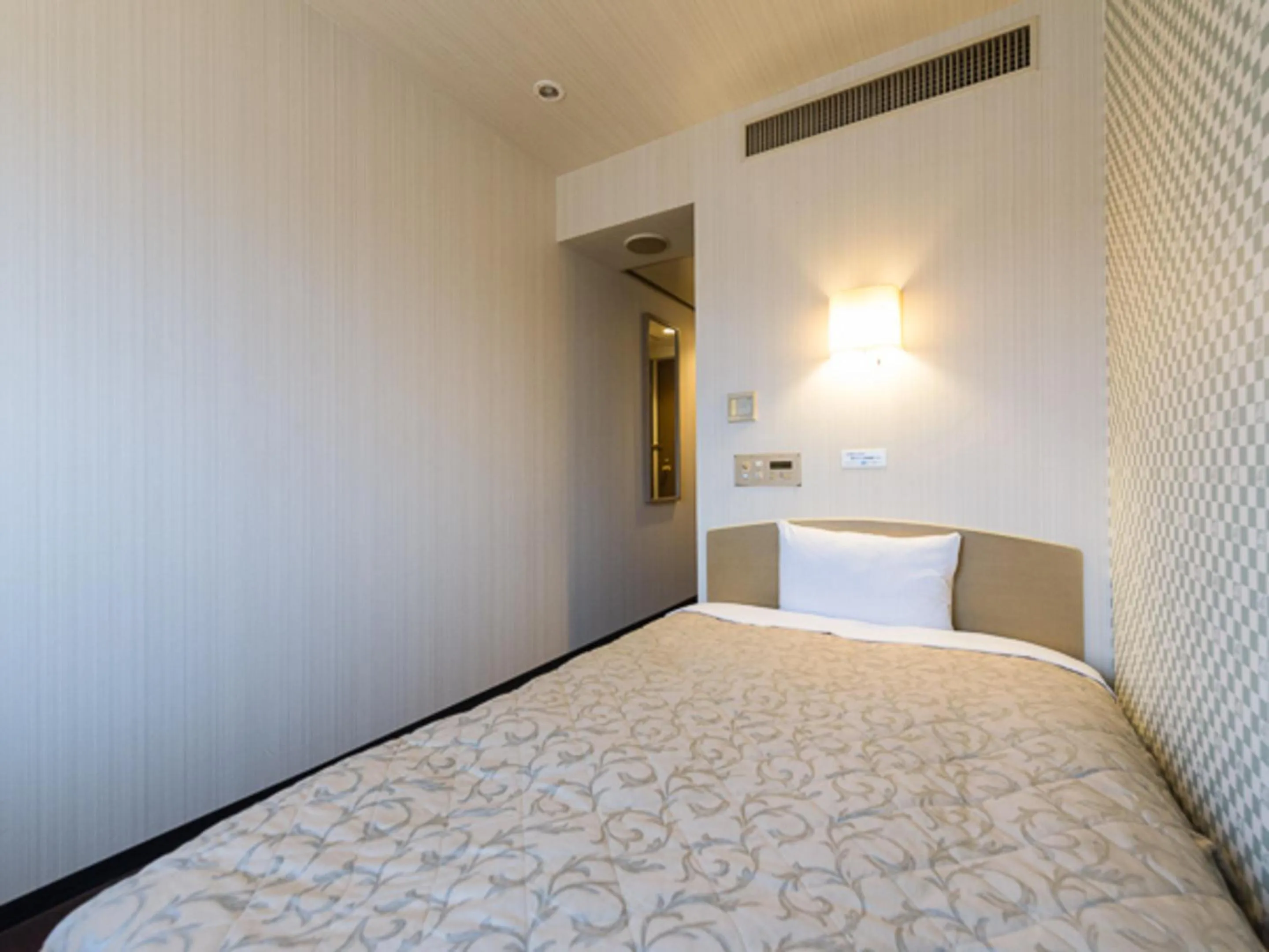 Photo of the whole room, Bed in HOTEL LiVEMAX Kofu