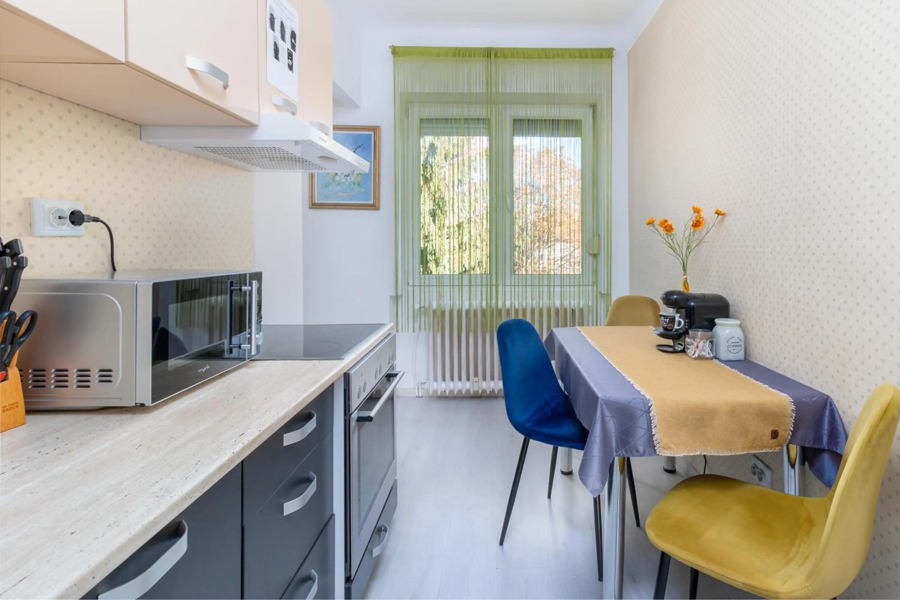 Kitchen or kitchenette in Moonlight Central Apartments