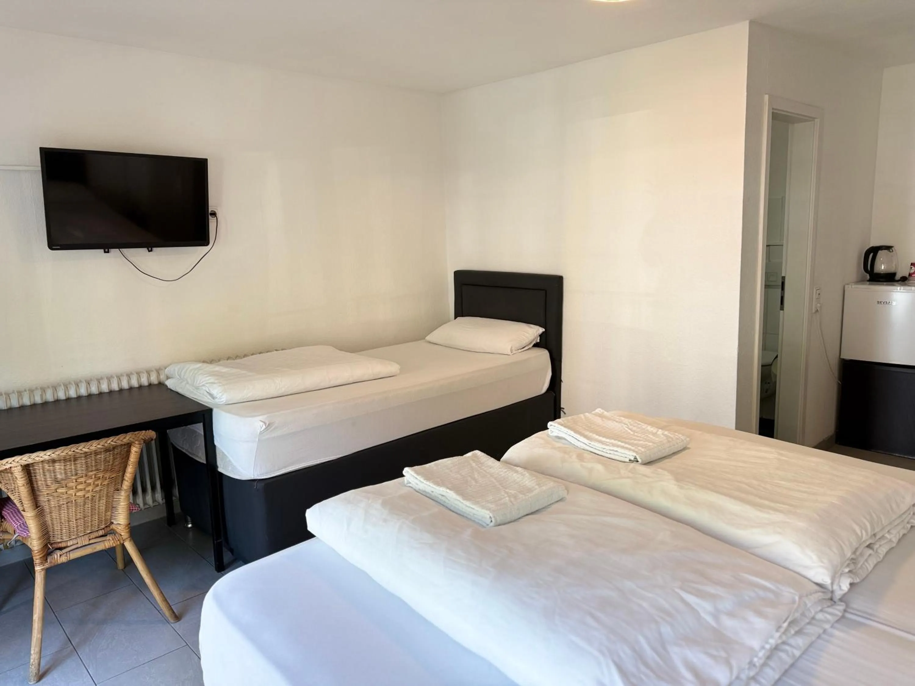 Bed in Hotel Garni Emir