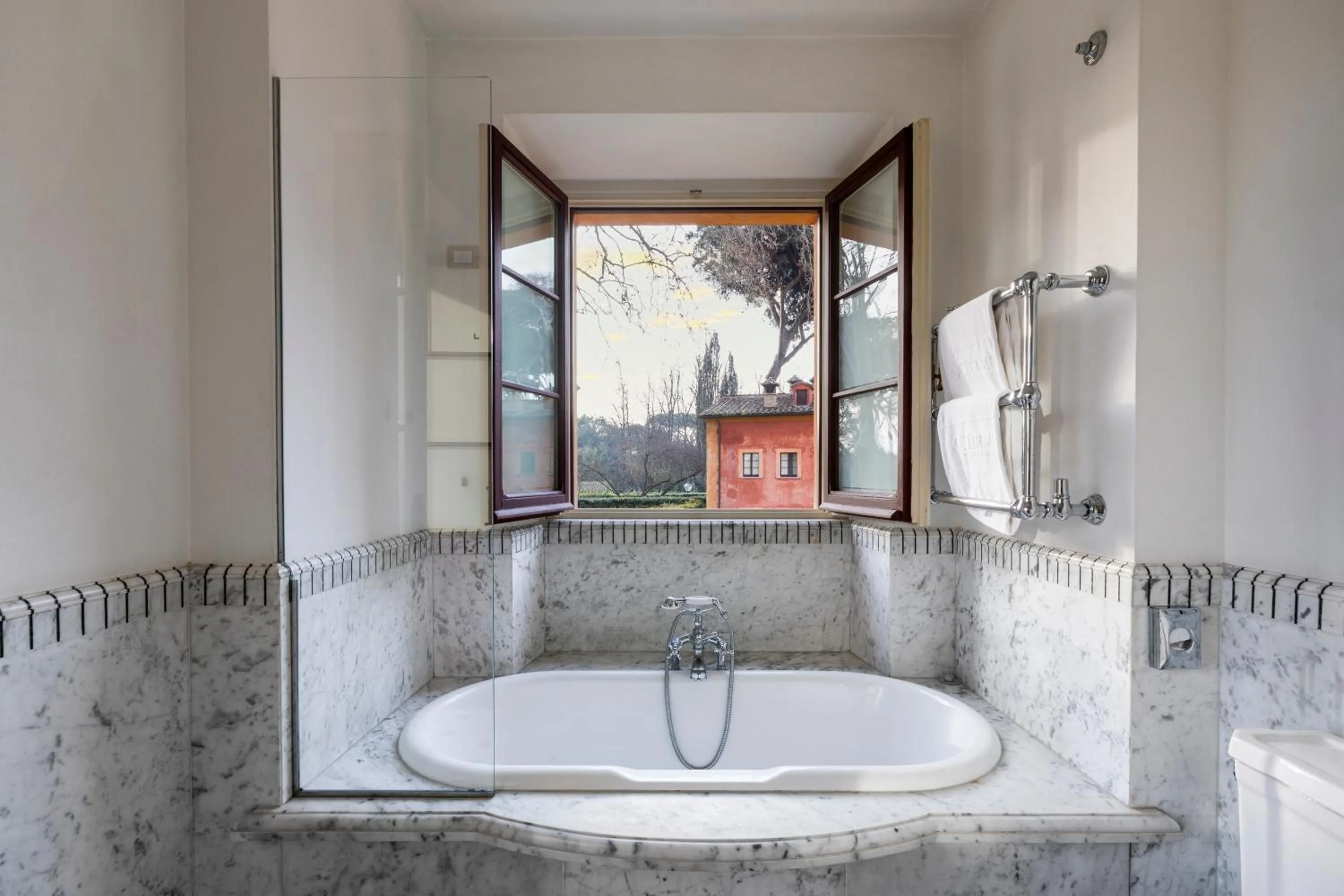 Bathroom in QC Grand Hotel Roma