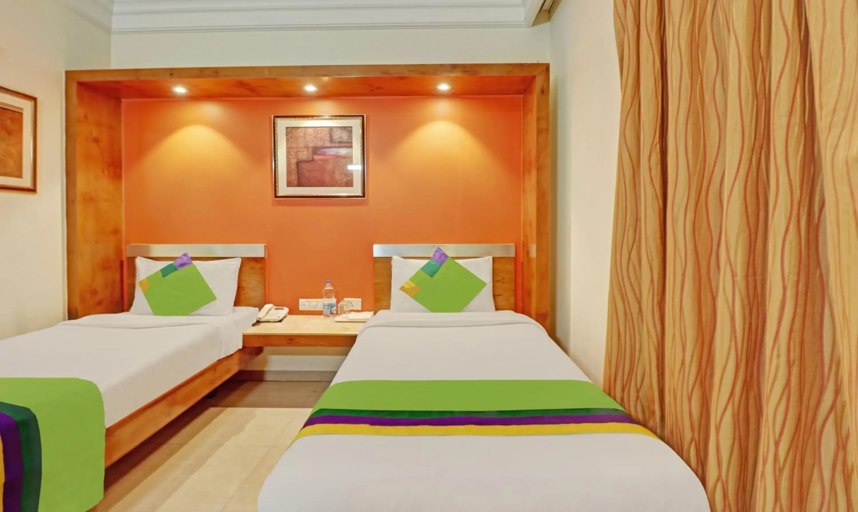 Bedroom, Bed in Treebo Suraksha Inn Bedroom, Bed in Treebo Suraksha Inn