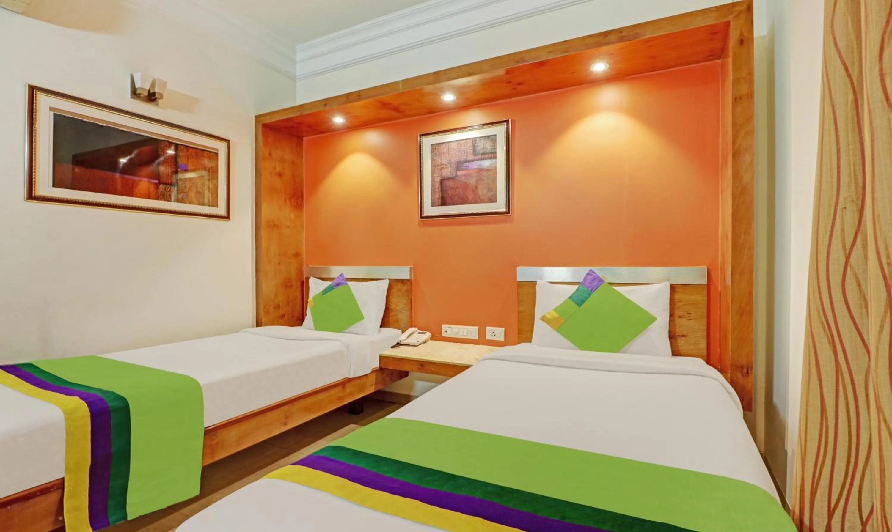 Bedroom, Bed in Treebo Suraksha Inn